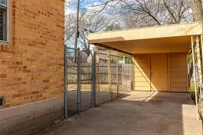 Covered parking space with some additional storage.
