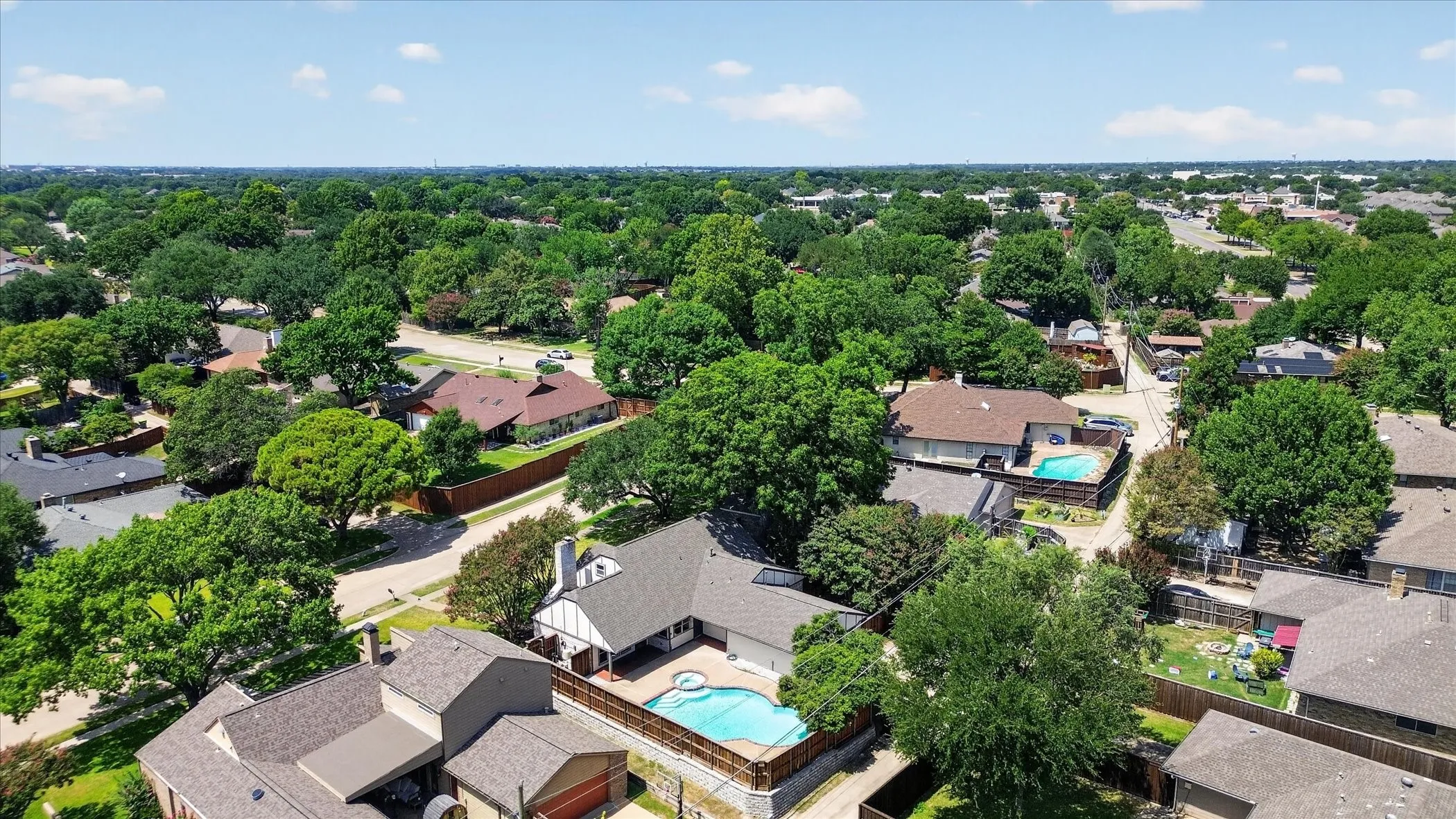 Expansive neighborhood with mature tree coverage