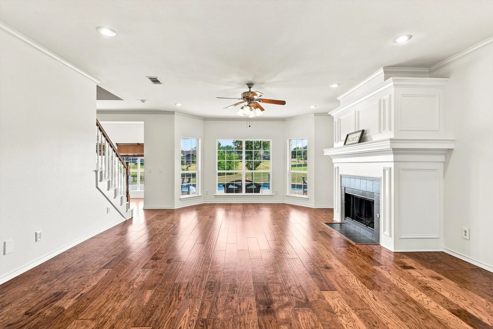 This is the View! Beautiful 1.23 acre lot almost floor ceiling windows that allows for natural light and the relaxing view of the pool.