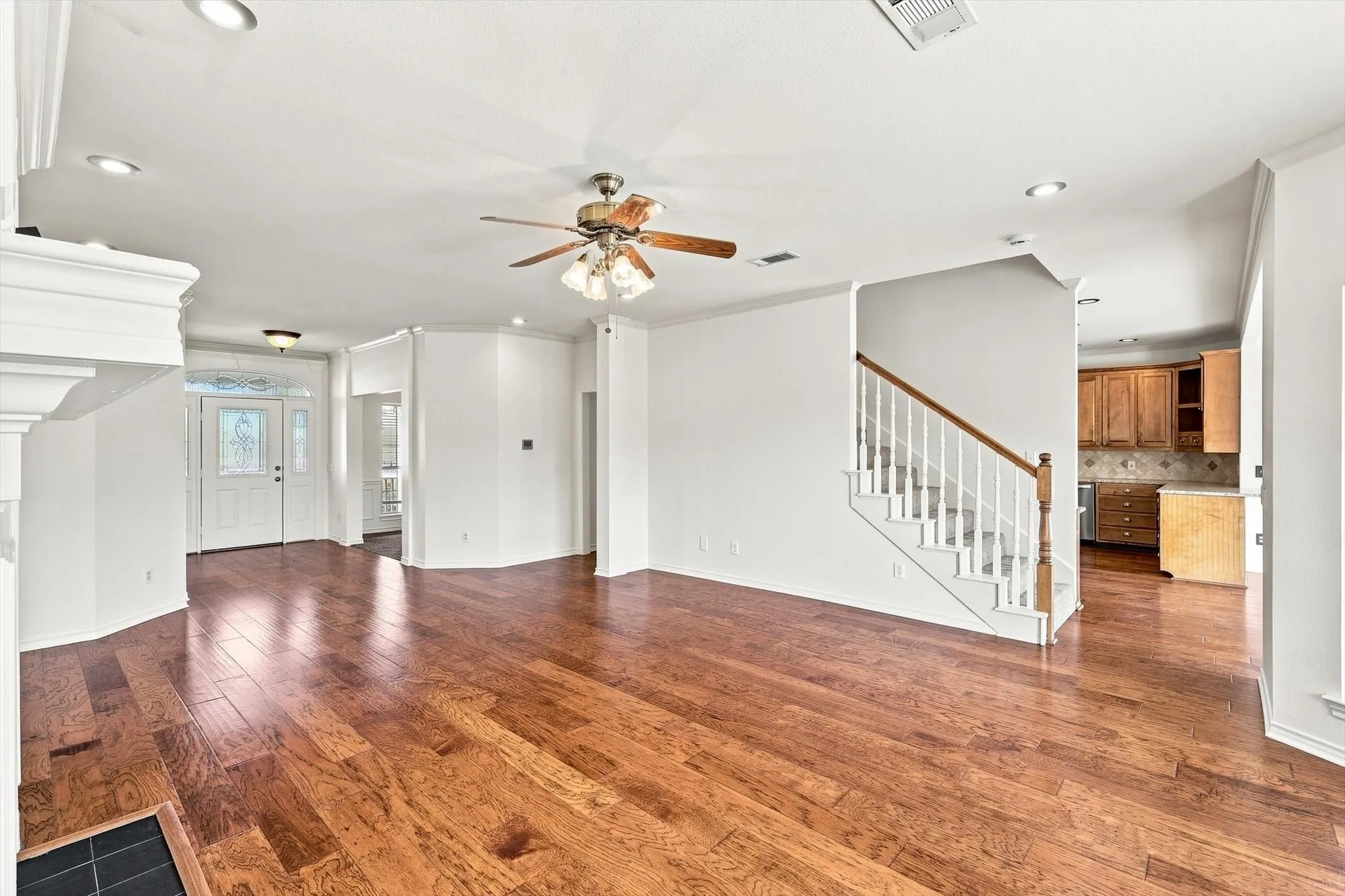 Newly painted with a floorplan that is spacious and flows easily from every area of home. Floor provide the warm glow that sets the home apart.