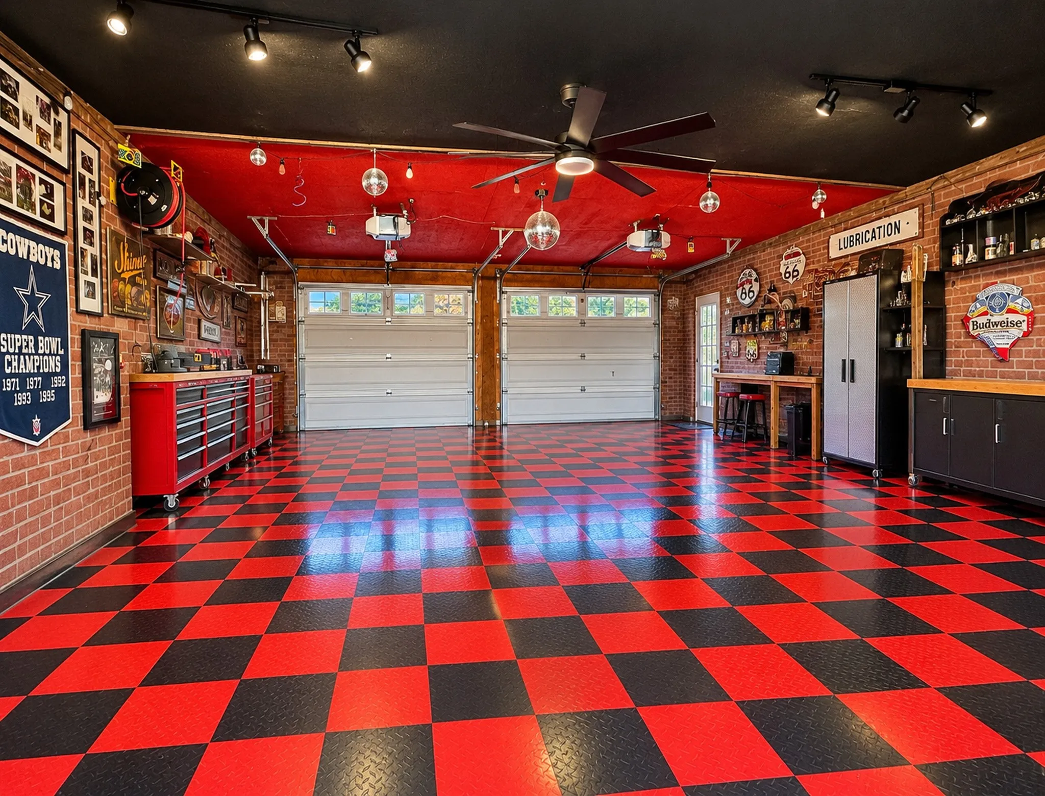 4 car garage climate controlled garage. The tiles can easily be removed. Or think man cave, teen retreat. Exposed brick walls, and track lighting