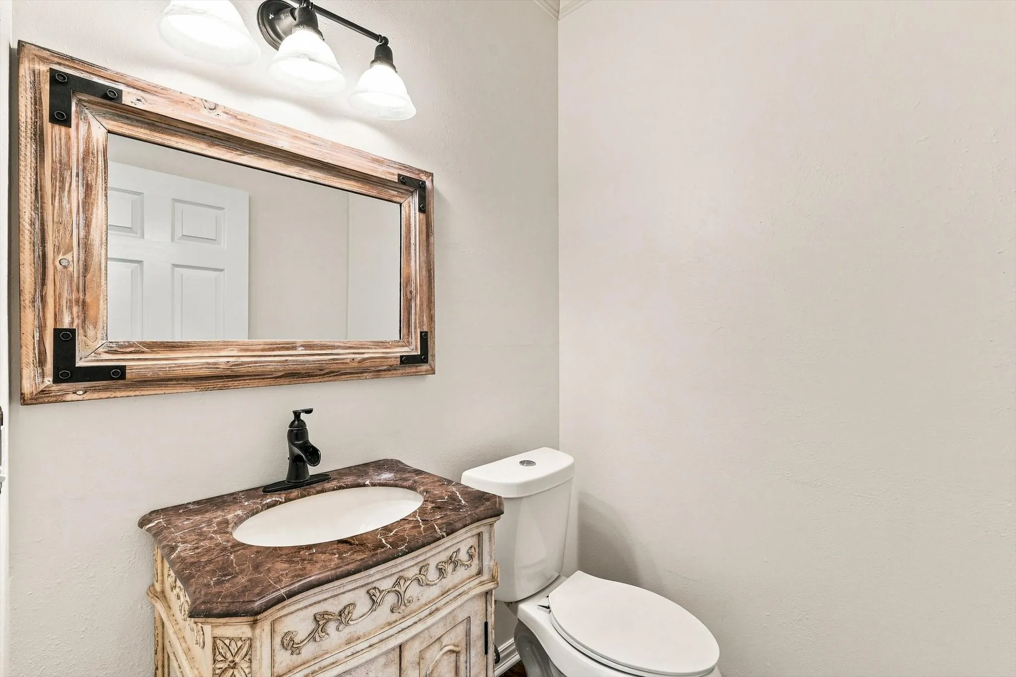 Guest downstairs half bath.