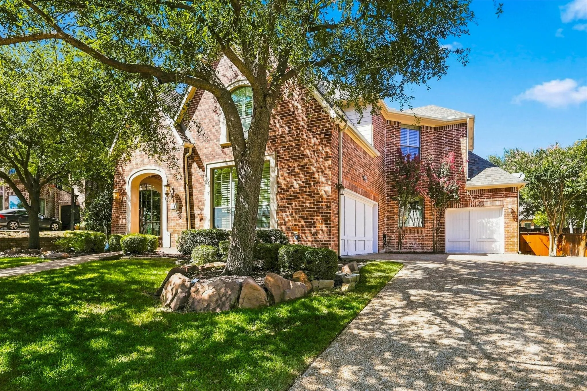 This beautiful home boasts a 3 car garage.