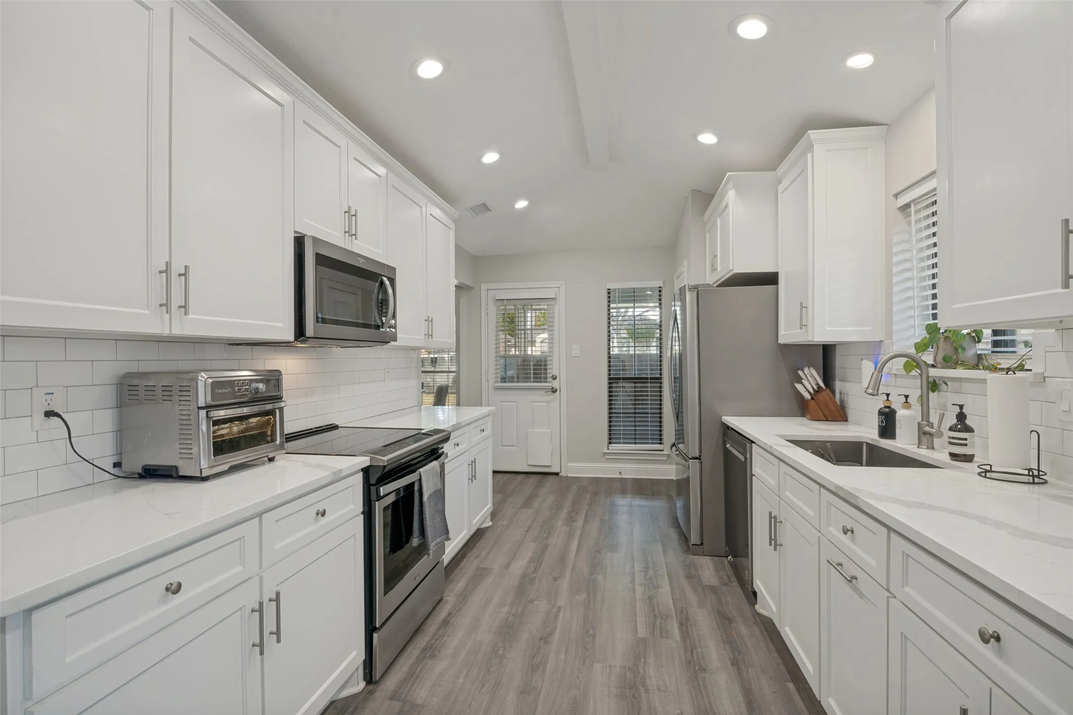 Plenty of counter space and has entrance to front patio space