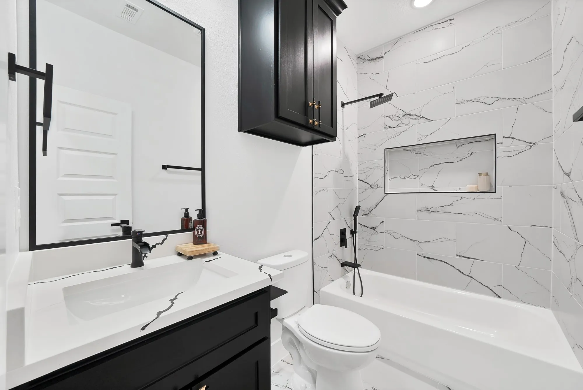 White and gray marble-look tile flooring