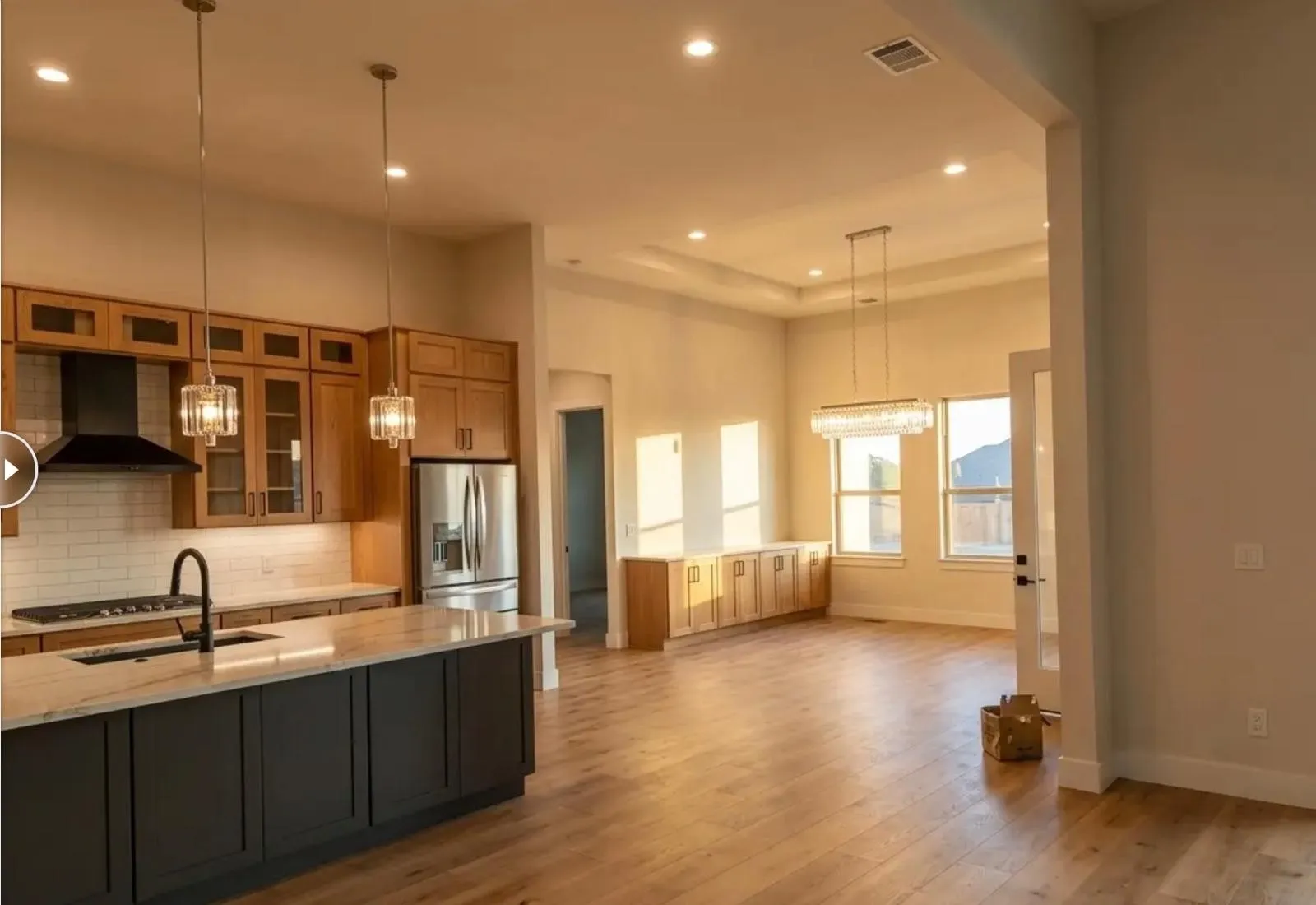 Gourmet kitchen with an island, stone countertops, and stainless steel appliances