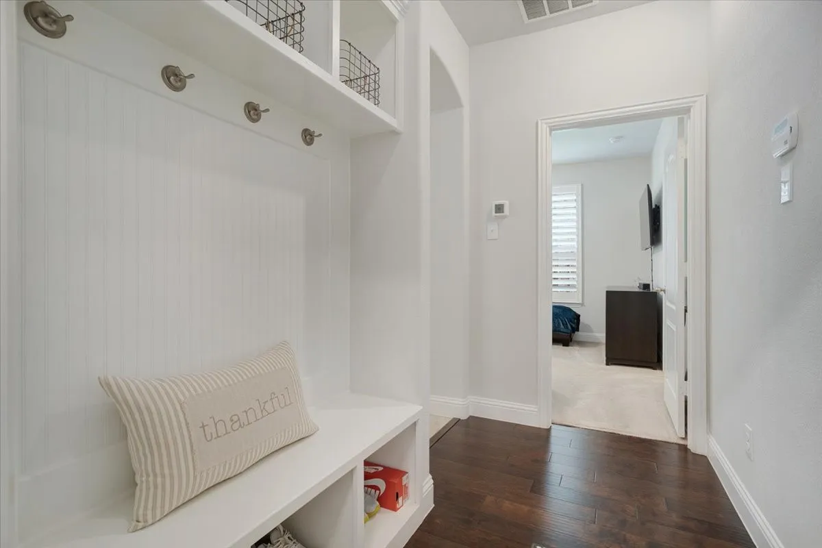 Built-in hall tree with beadboard backing and storage cubbies
