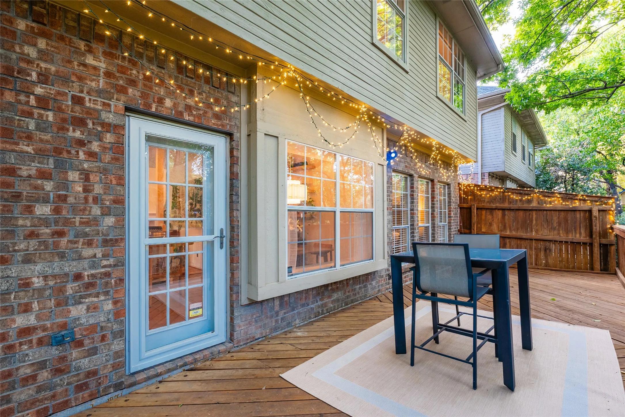 Brick exterior with an upper-level siding facade