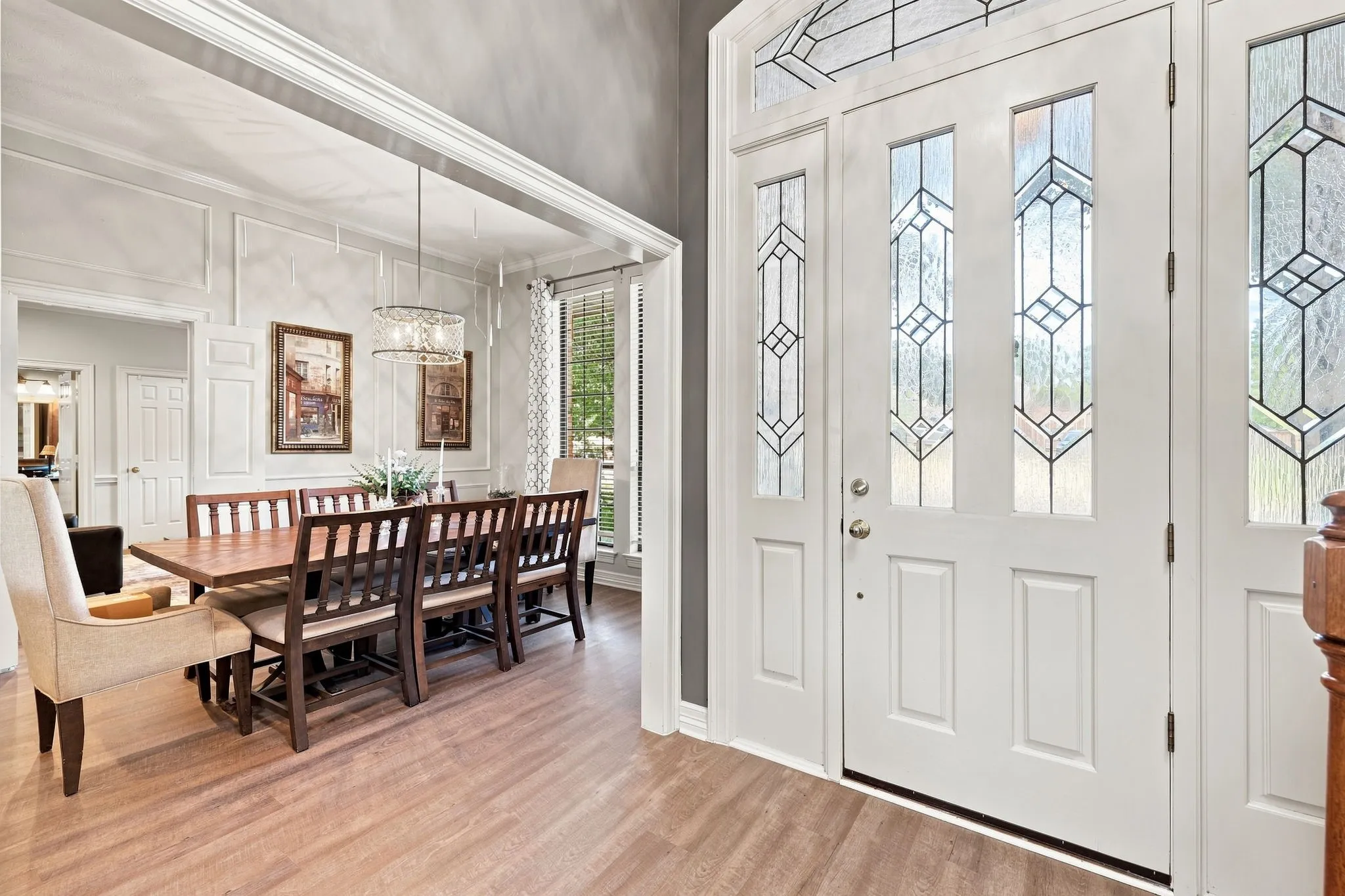 Entryway featuring a decorative leaded glass door and sidelights