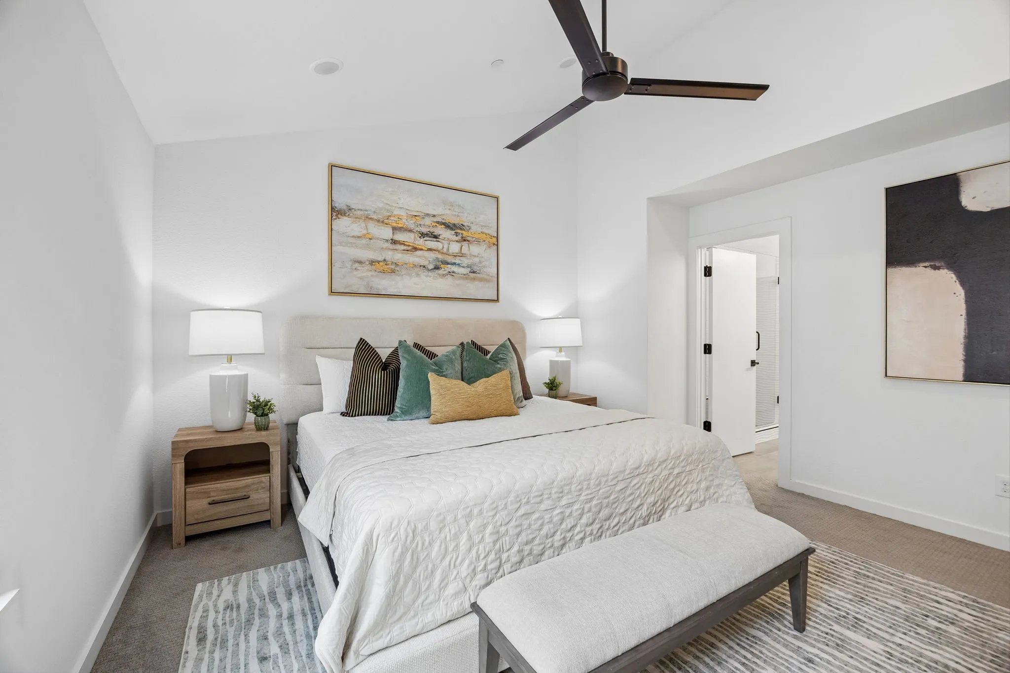 Vaulted ceiling with a flush-mounted ceiling fan, recessed lighting, and carpet flooring