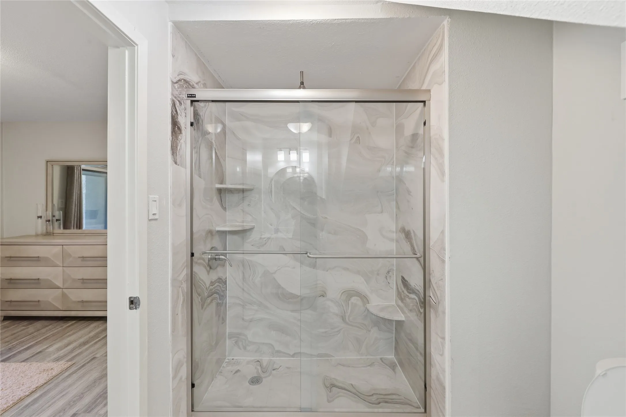 Walk-in shower in 1st floor bedroom.