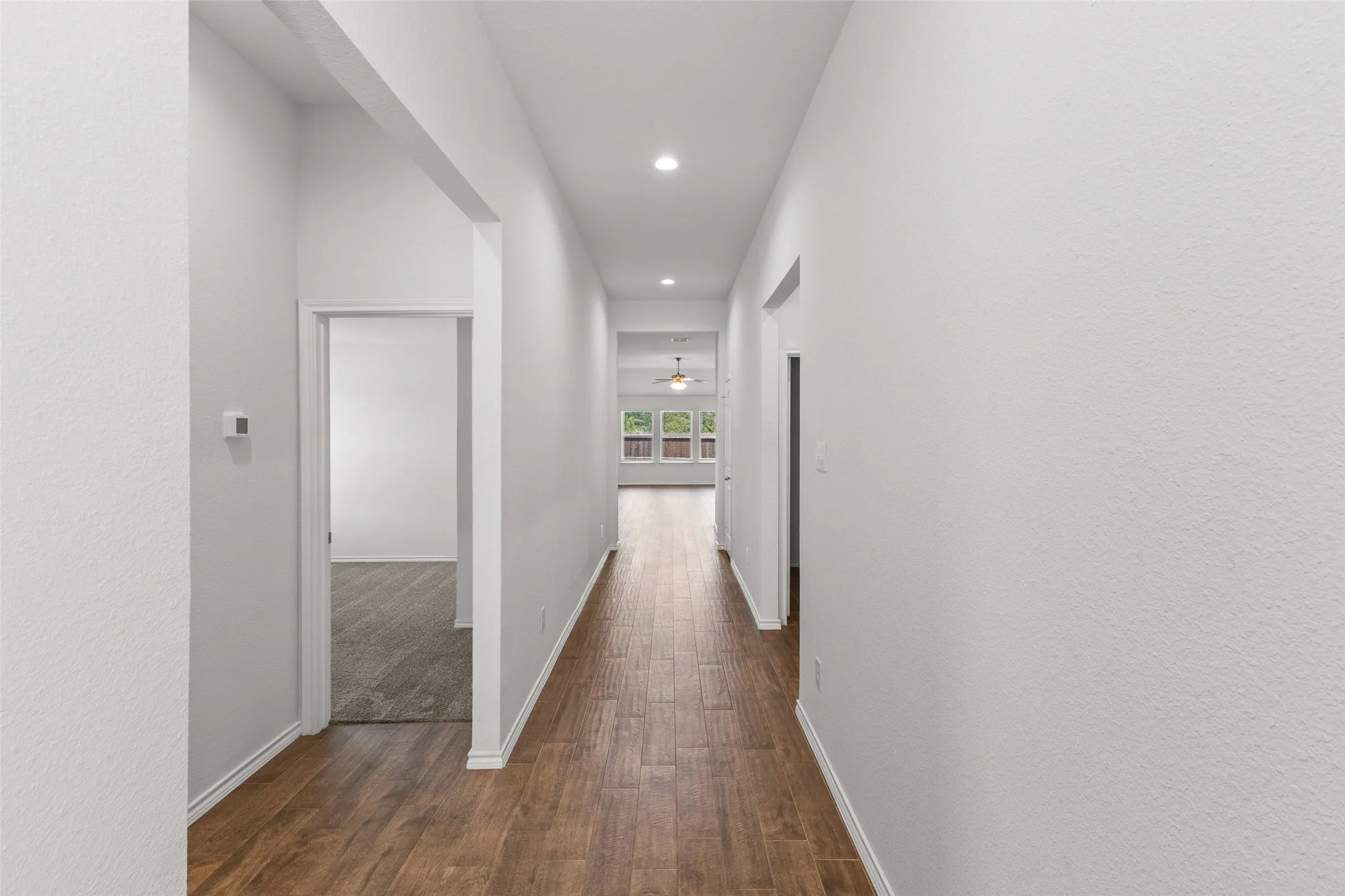 View from front door into living room and bedroom #3