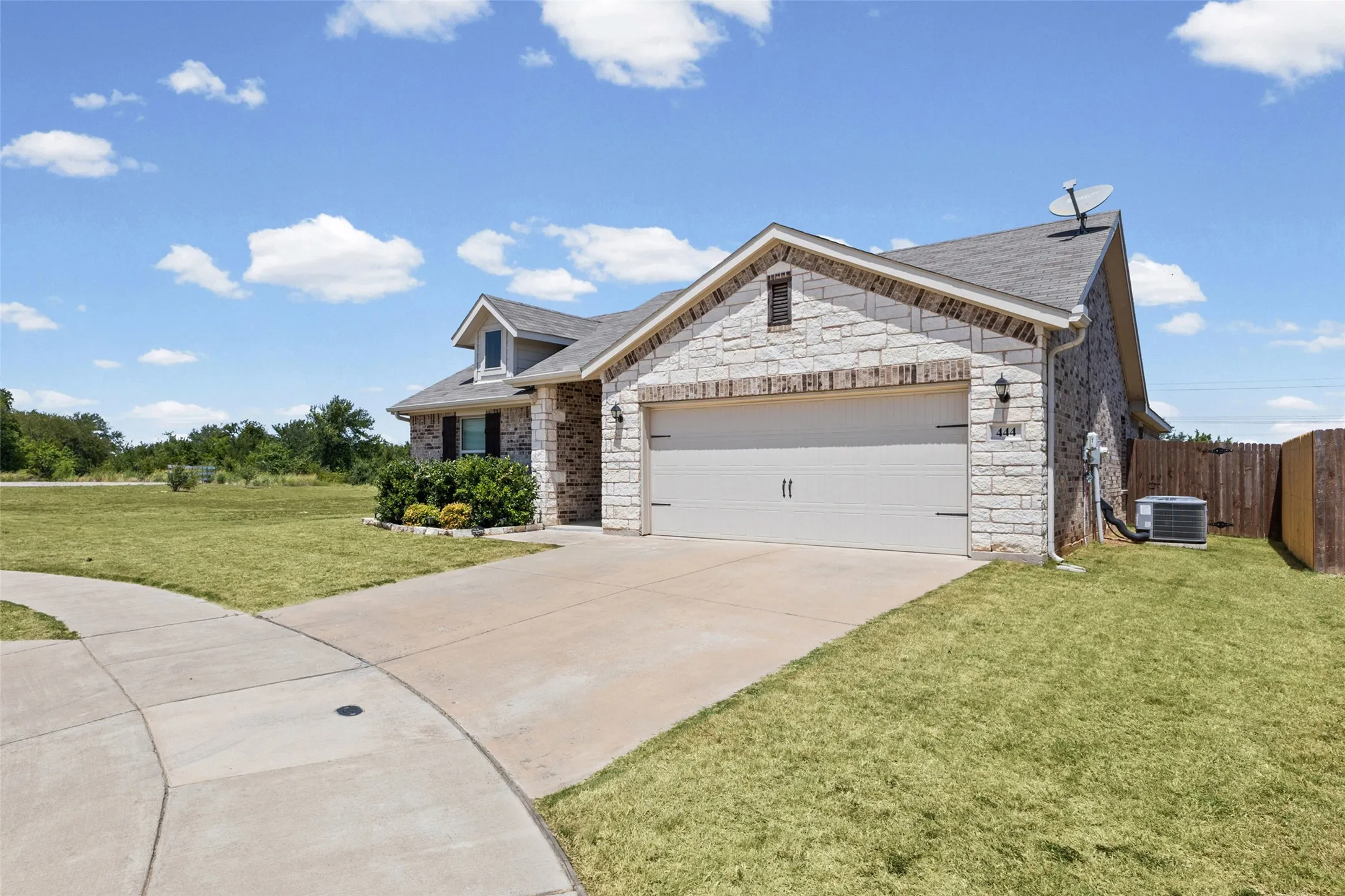 Large lot with green space next door.