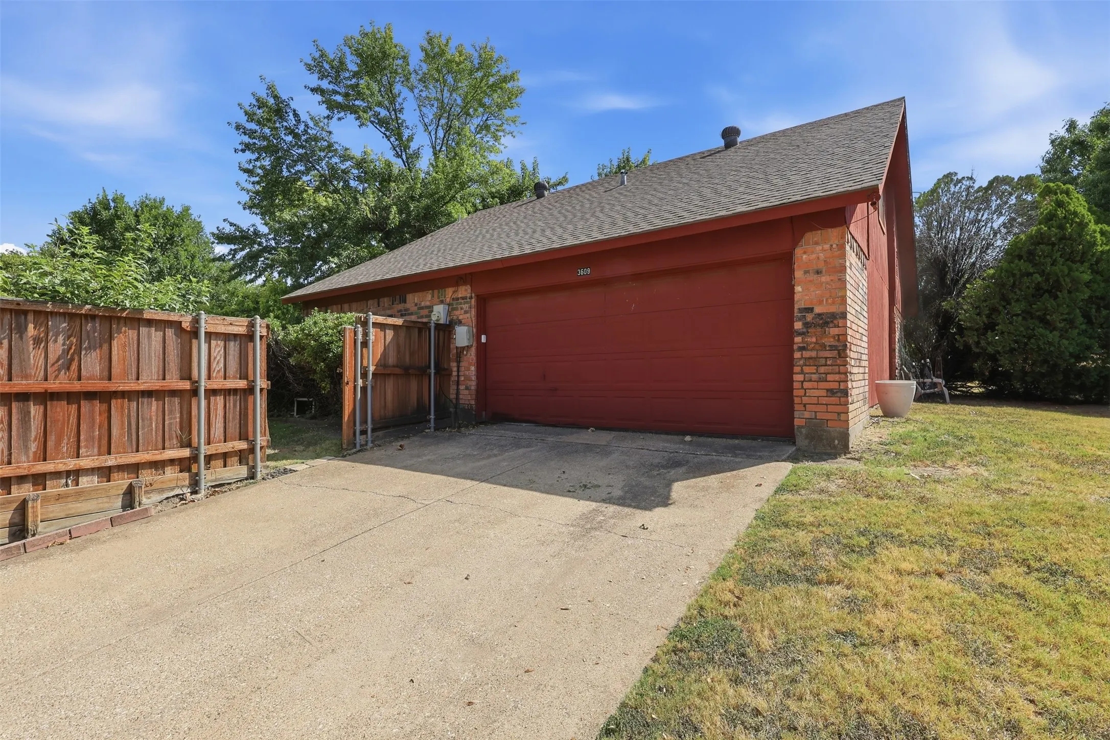 Driveway and attached 2 car garage.
