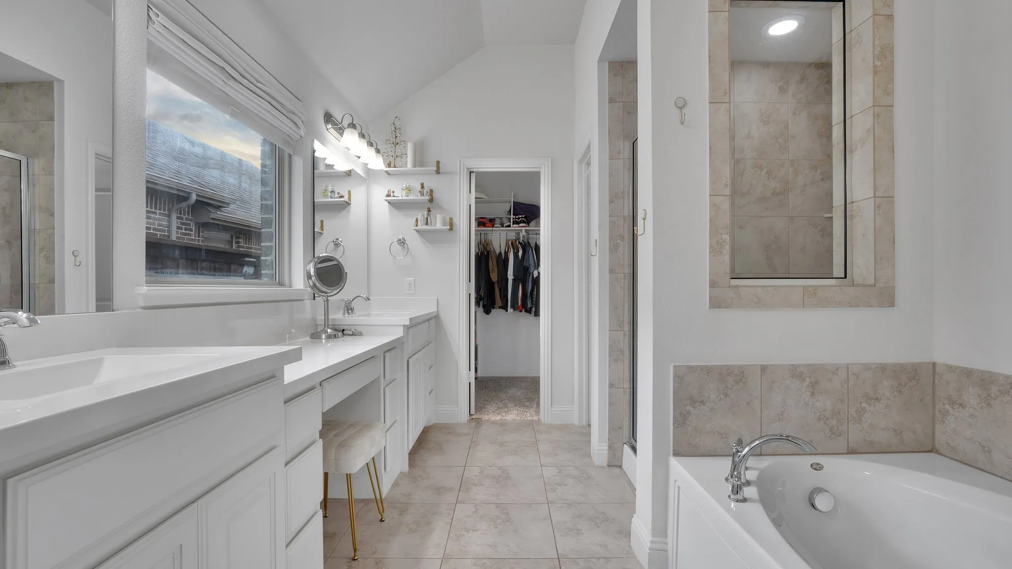 Dual vanity with under-mount sinks and integrated countertop