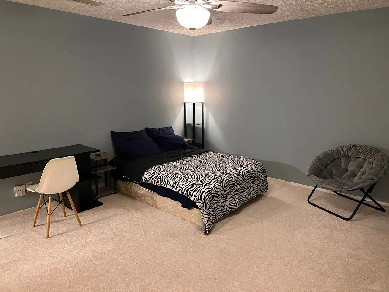 Neutral-toned carpeting throughout