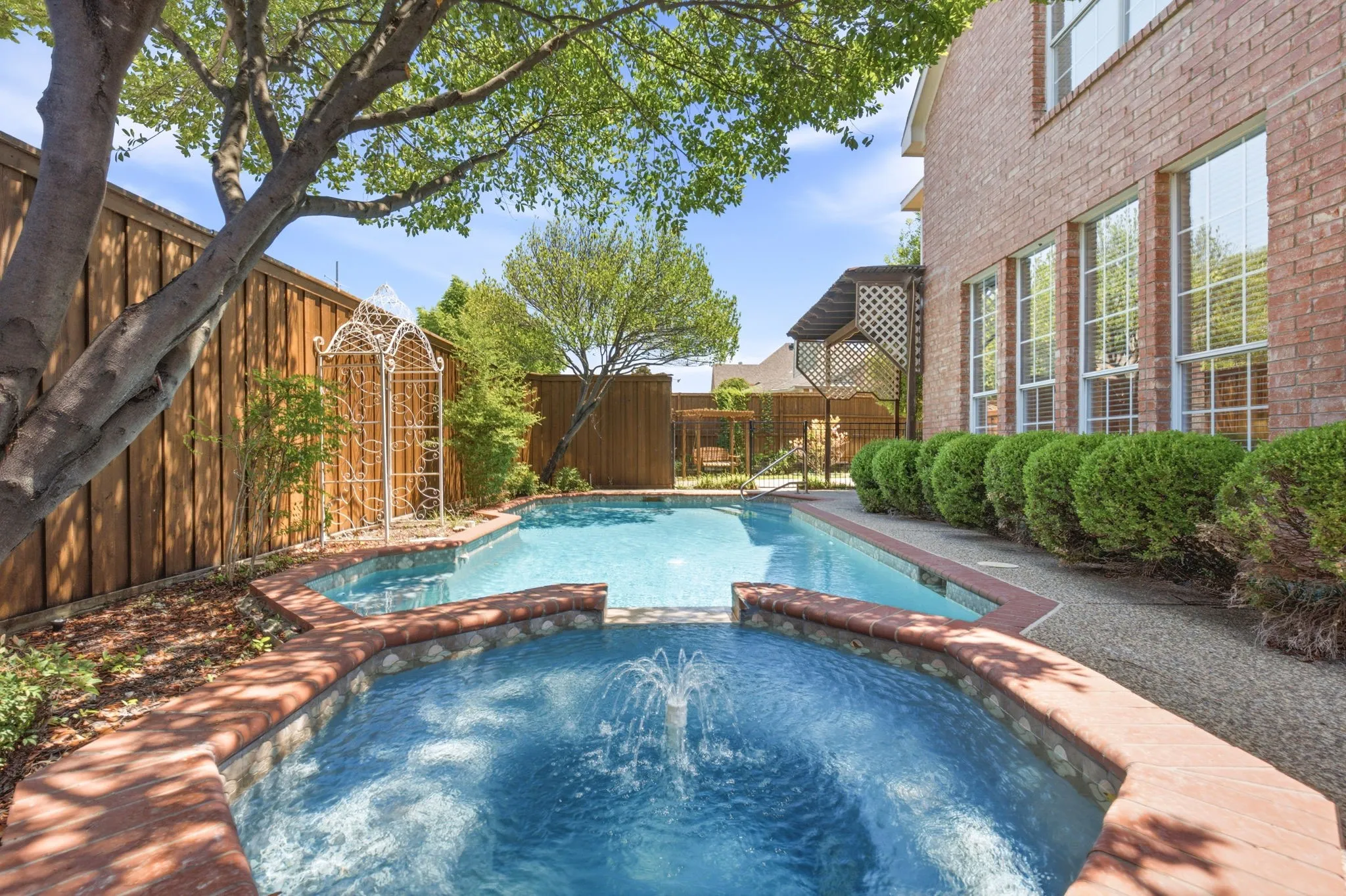 Game pool, spa with water feature.