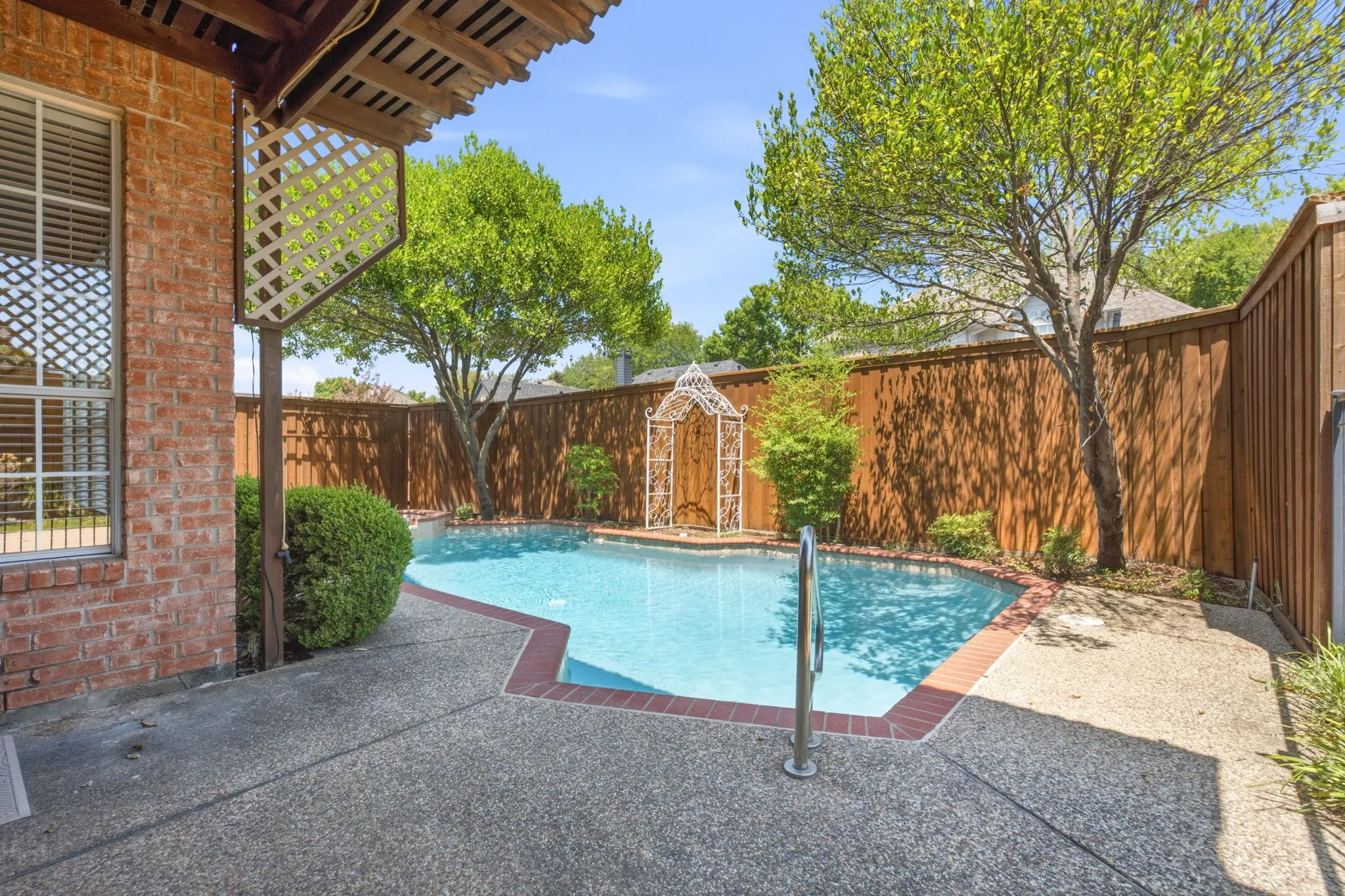 Game pool, spa with water feature.