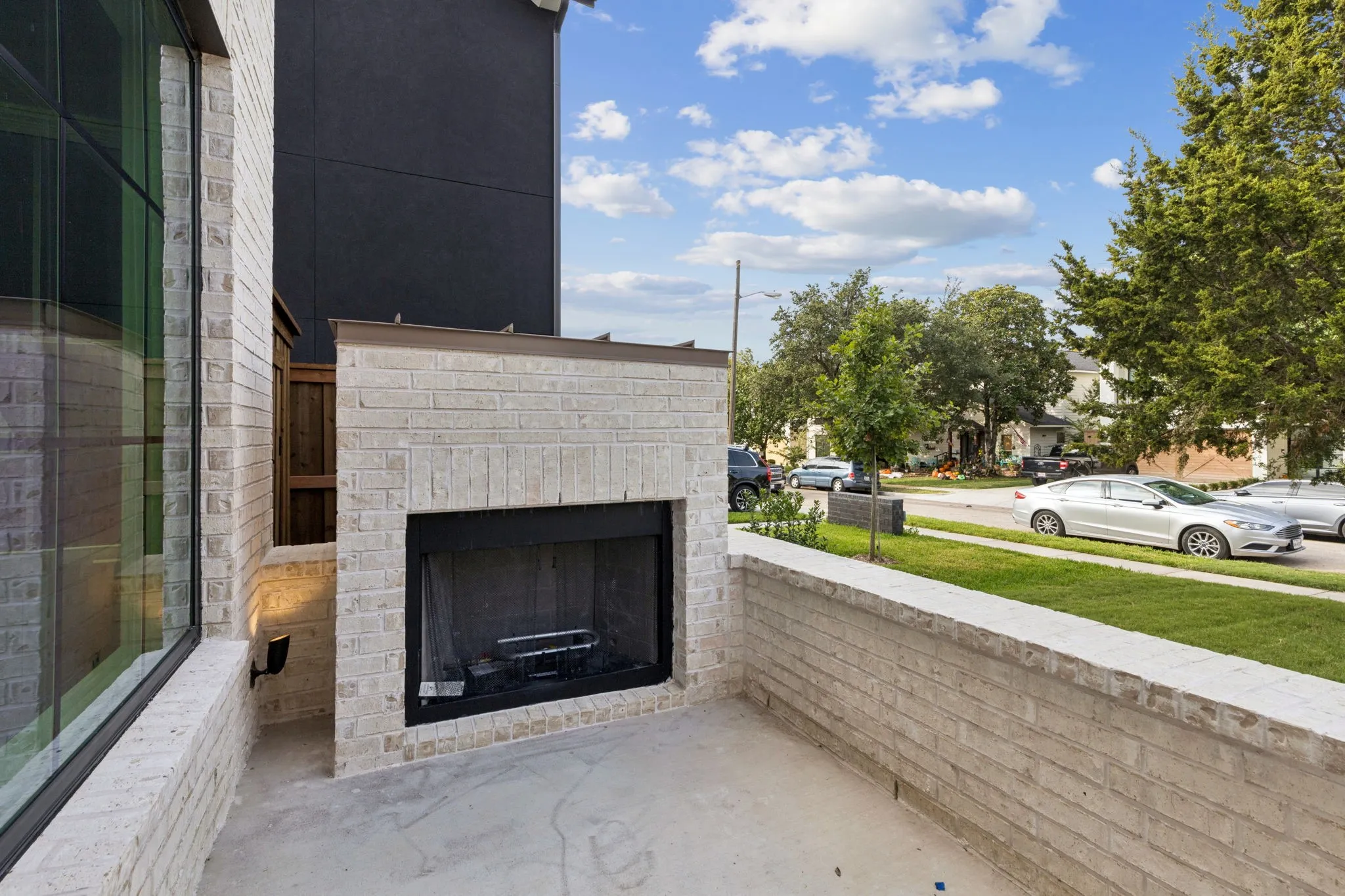 Tom Hughes Team - 2026 Euclid - Front Patio