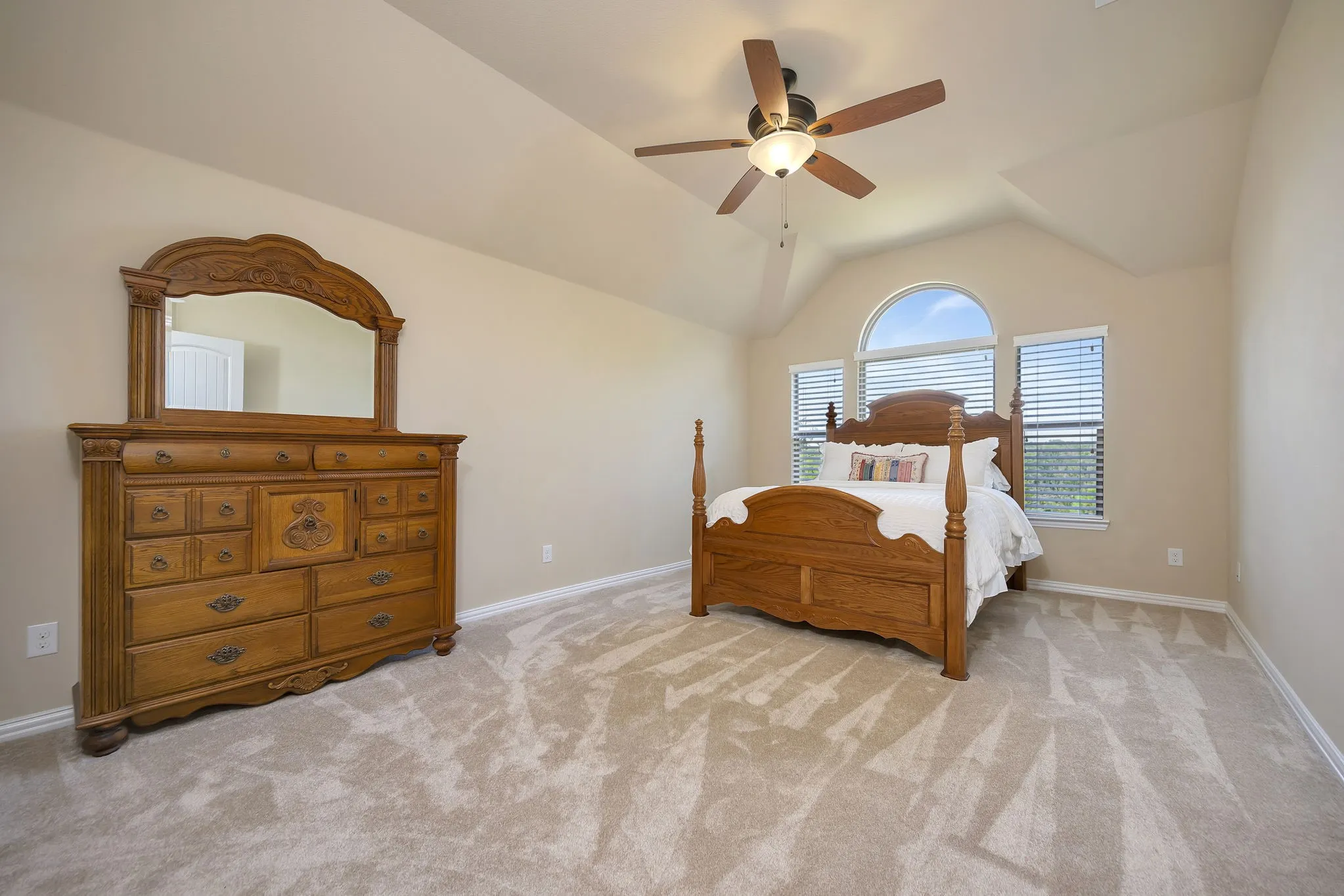 This upstairs bedroom has its own ensuite bathroom.