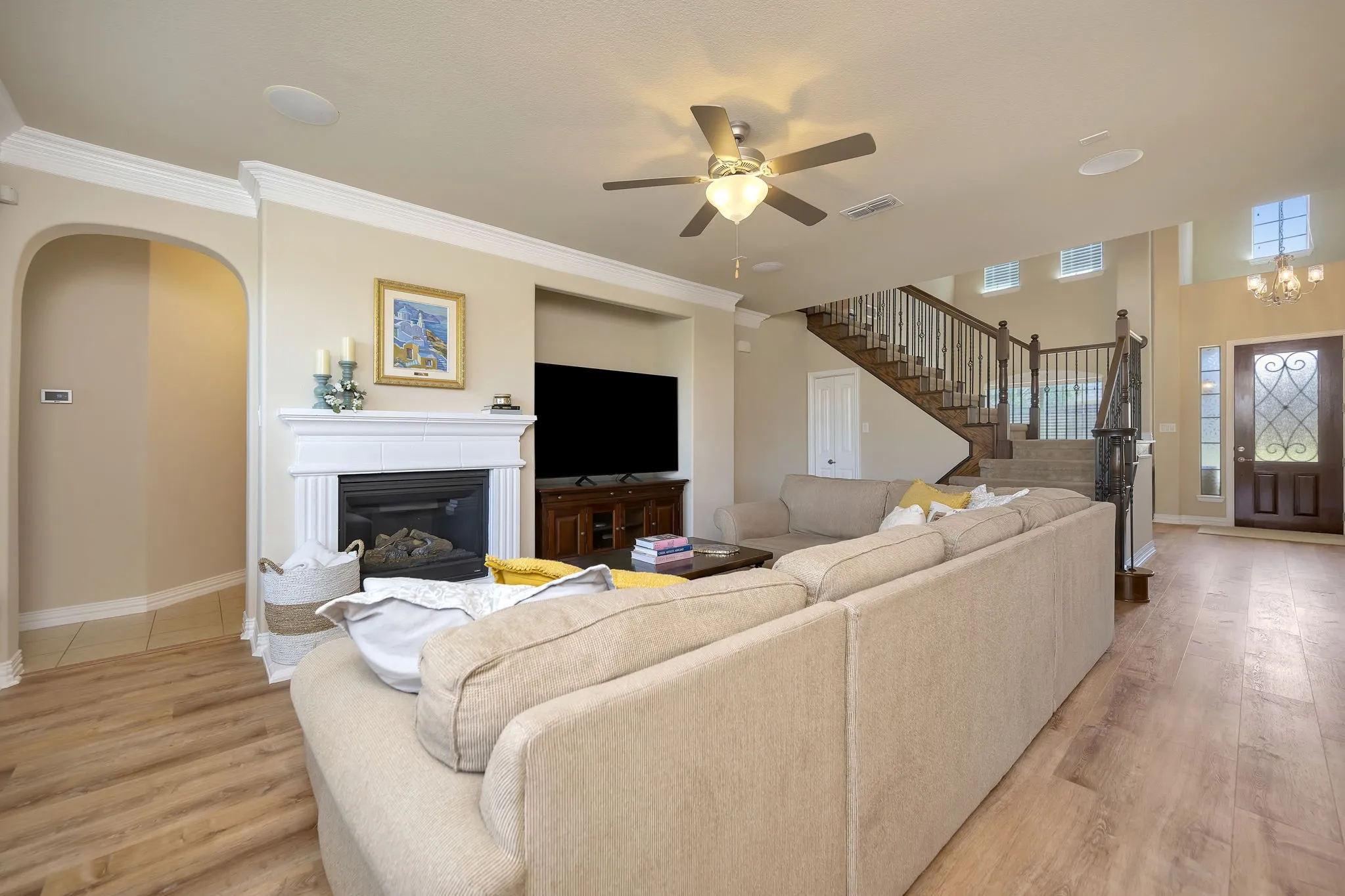 Spacious living room with gas fireplace.