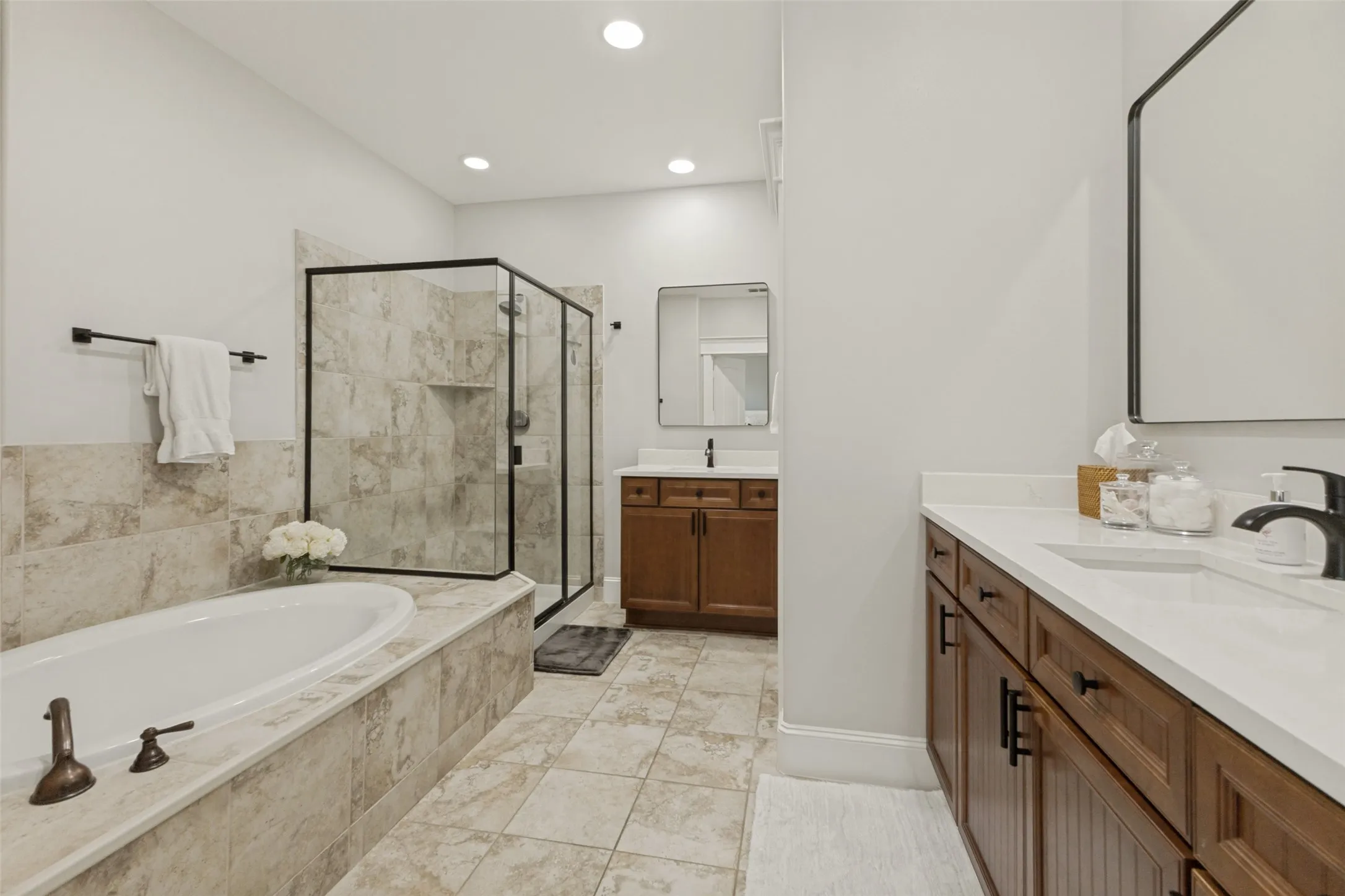 Dual sinks and separate tub/shower