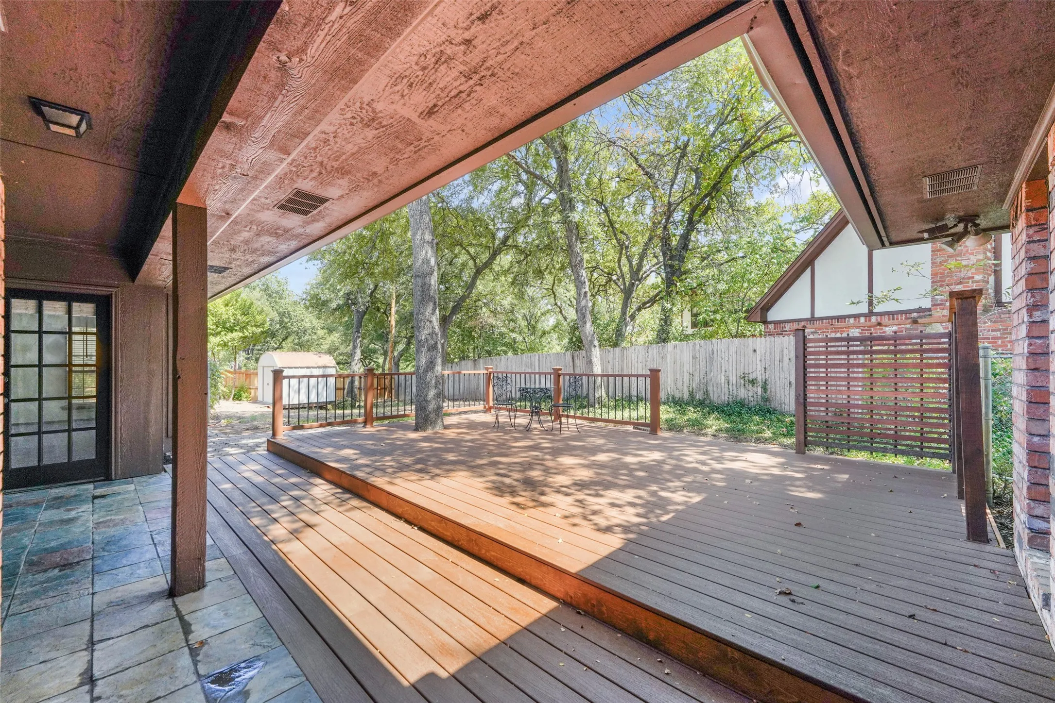 Brand New Trex expansive multi-level decking with black iron rails
