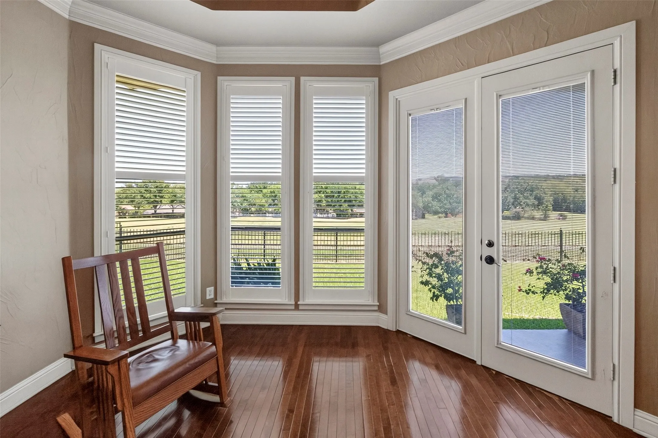 Primary bedroom with doors to patio