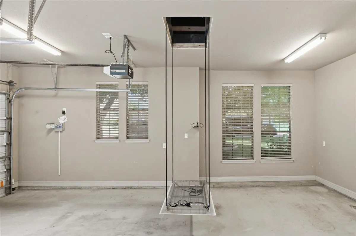 Dumbwaiter to lift items to attic storage