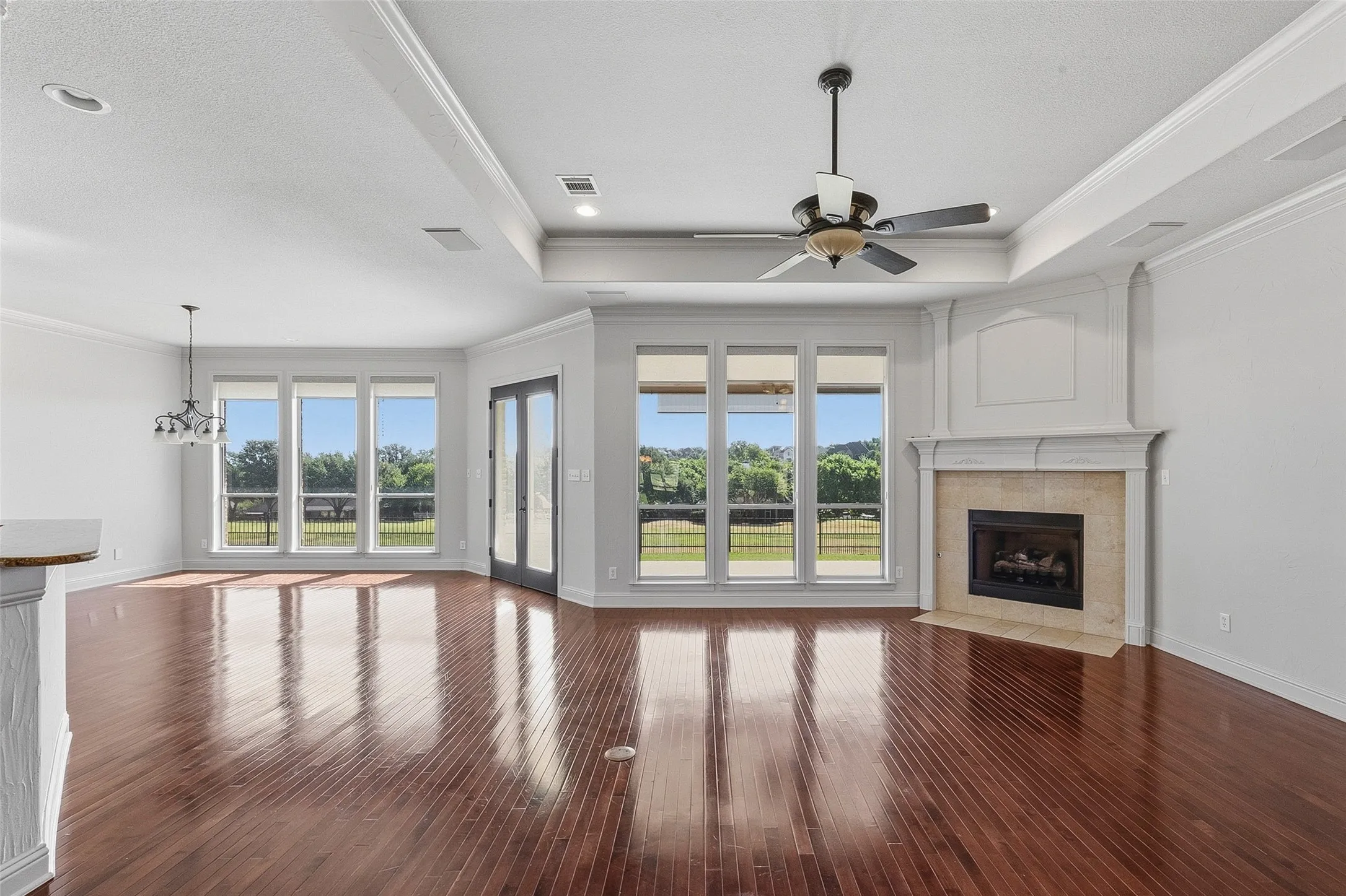 Wall of east facing windows in the living and dining area
