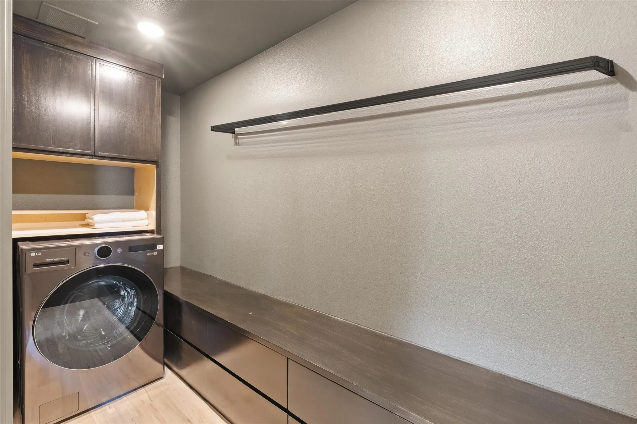 Primary Walk In Closet with Washer/Dryer Combo