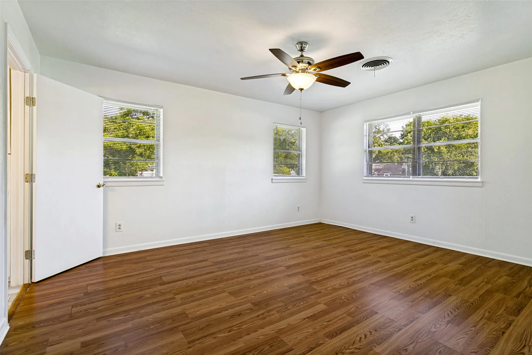 Primary bedroom with walk in closet