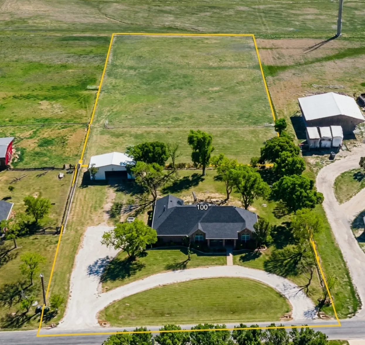 Residential property set on 2.7 acres outside city limits with no HOA, offering flexibility, space, privacy while maintaining a convenient location