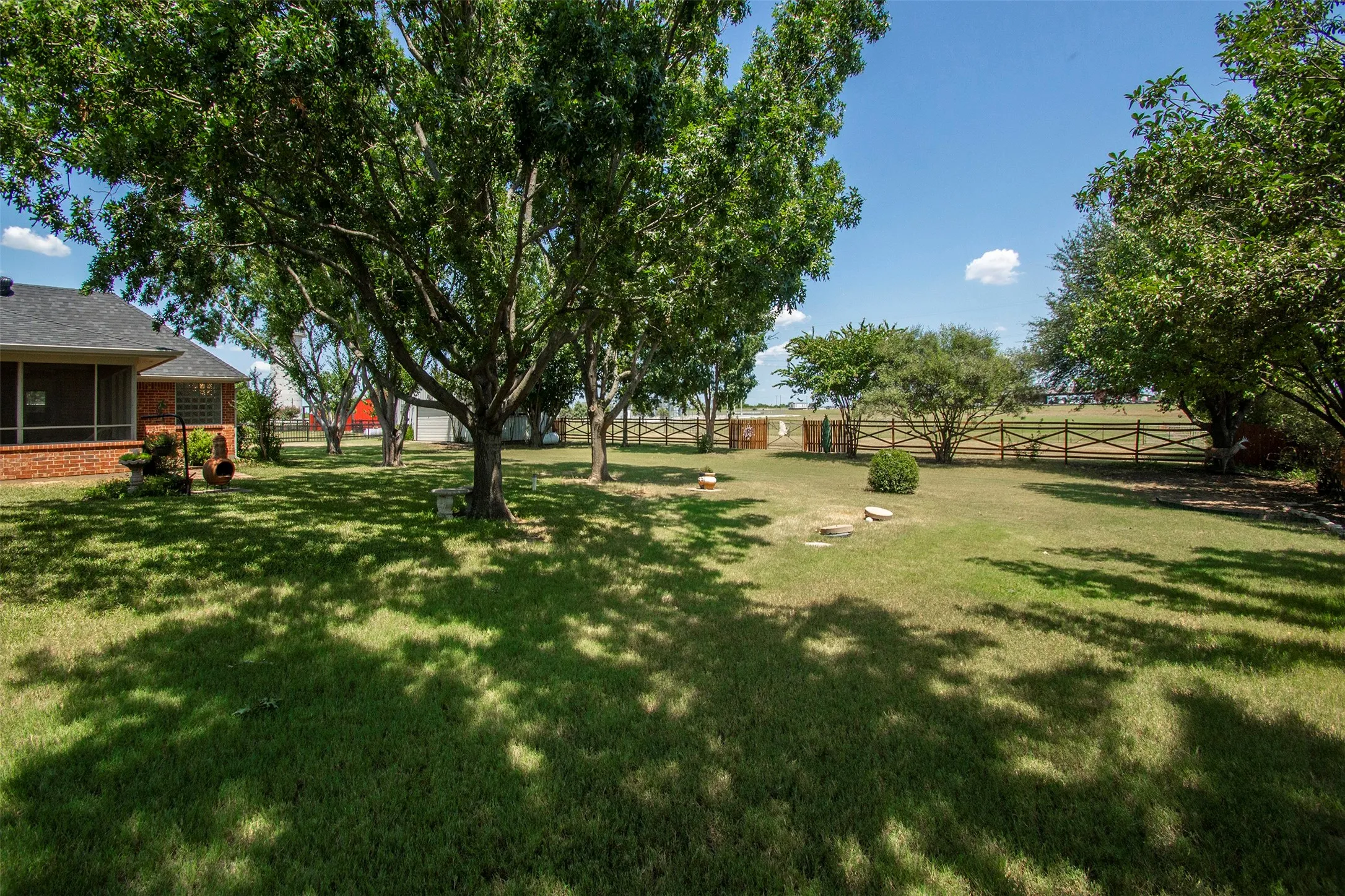 Private backyard with mature trees