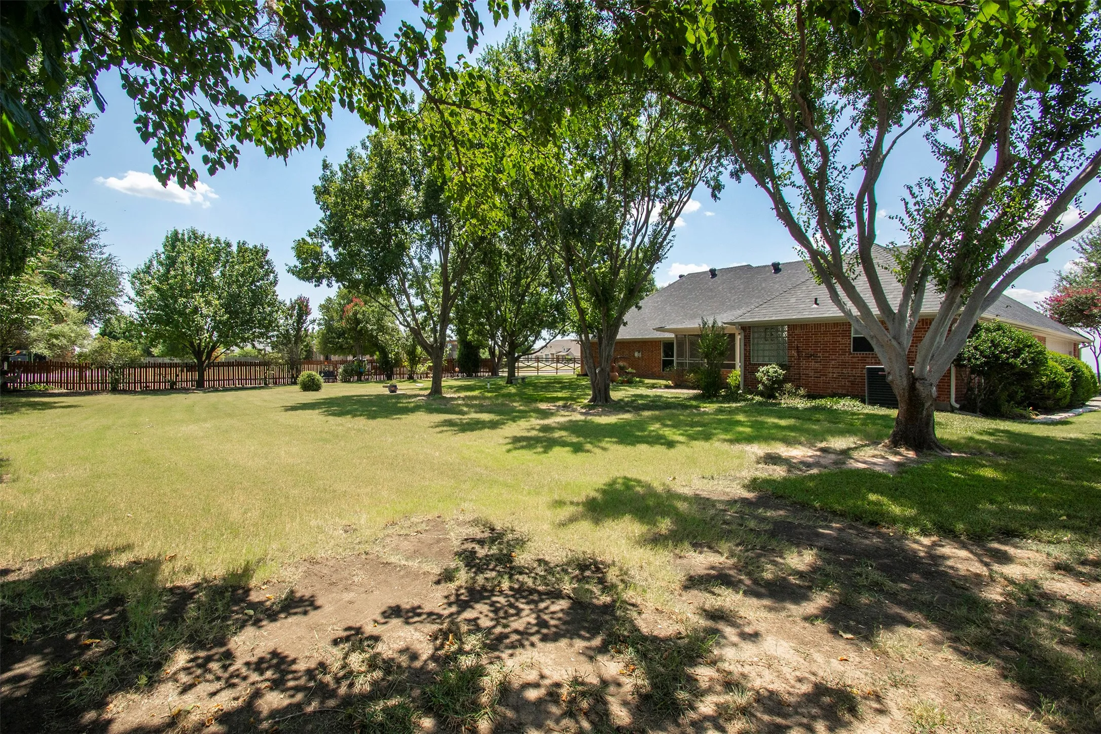 Private backyard with mature trees