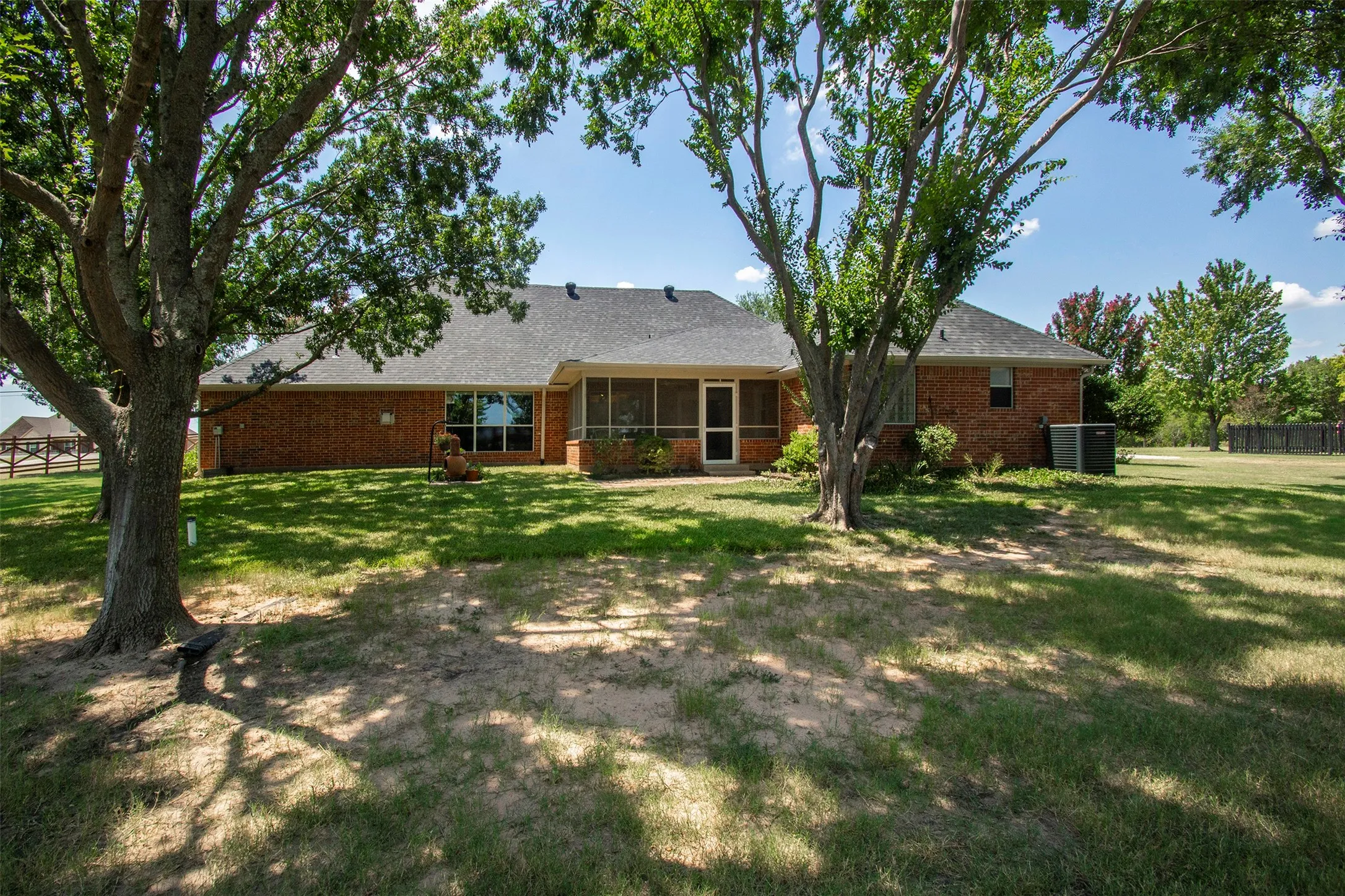 Private backyard with mature trees