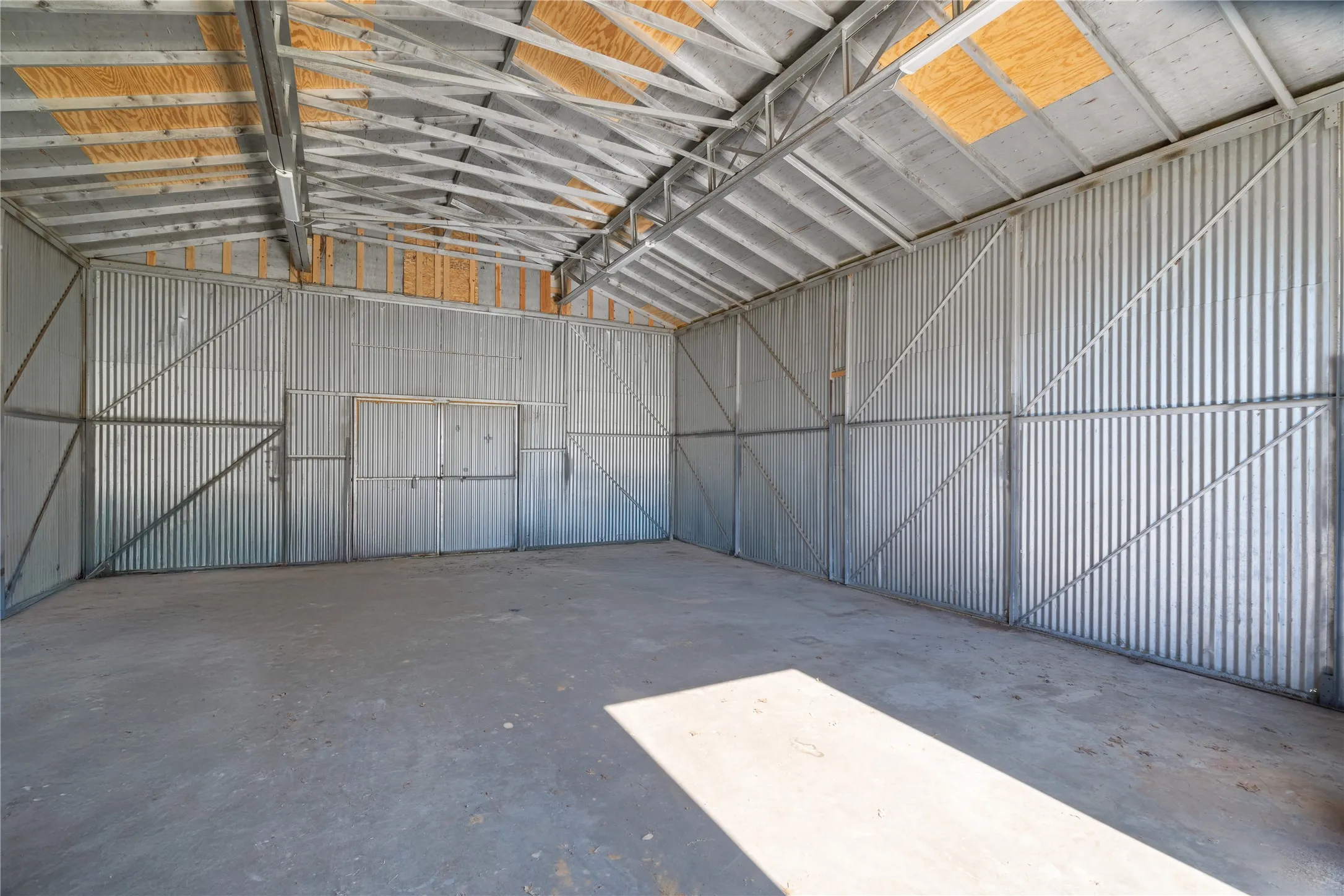 Garage with metal wall