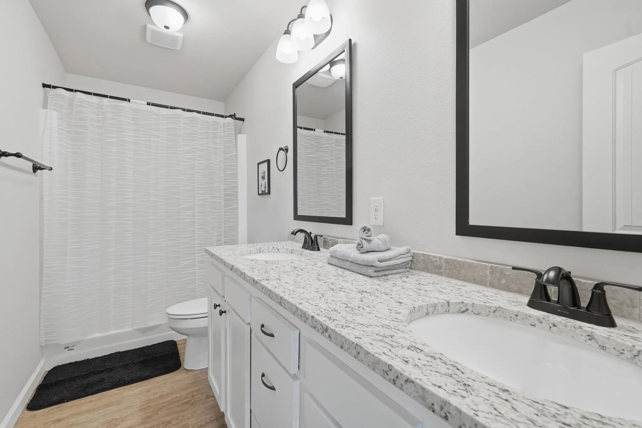Per seller, these are pictures of an identical house but not the exact house.