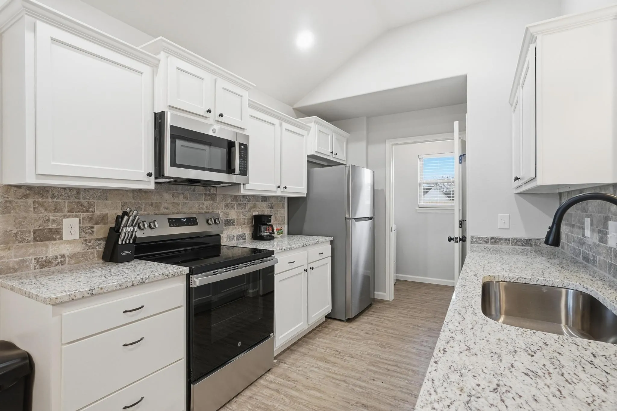 Per seller, these are pictures of an identical house but not the exact house.