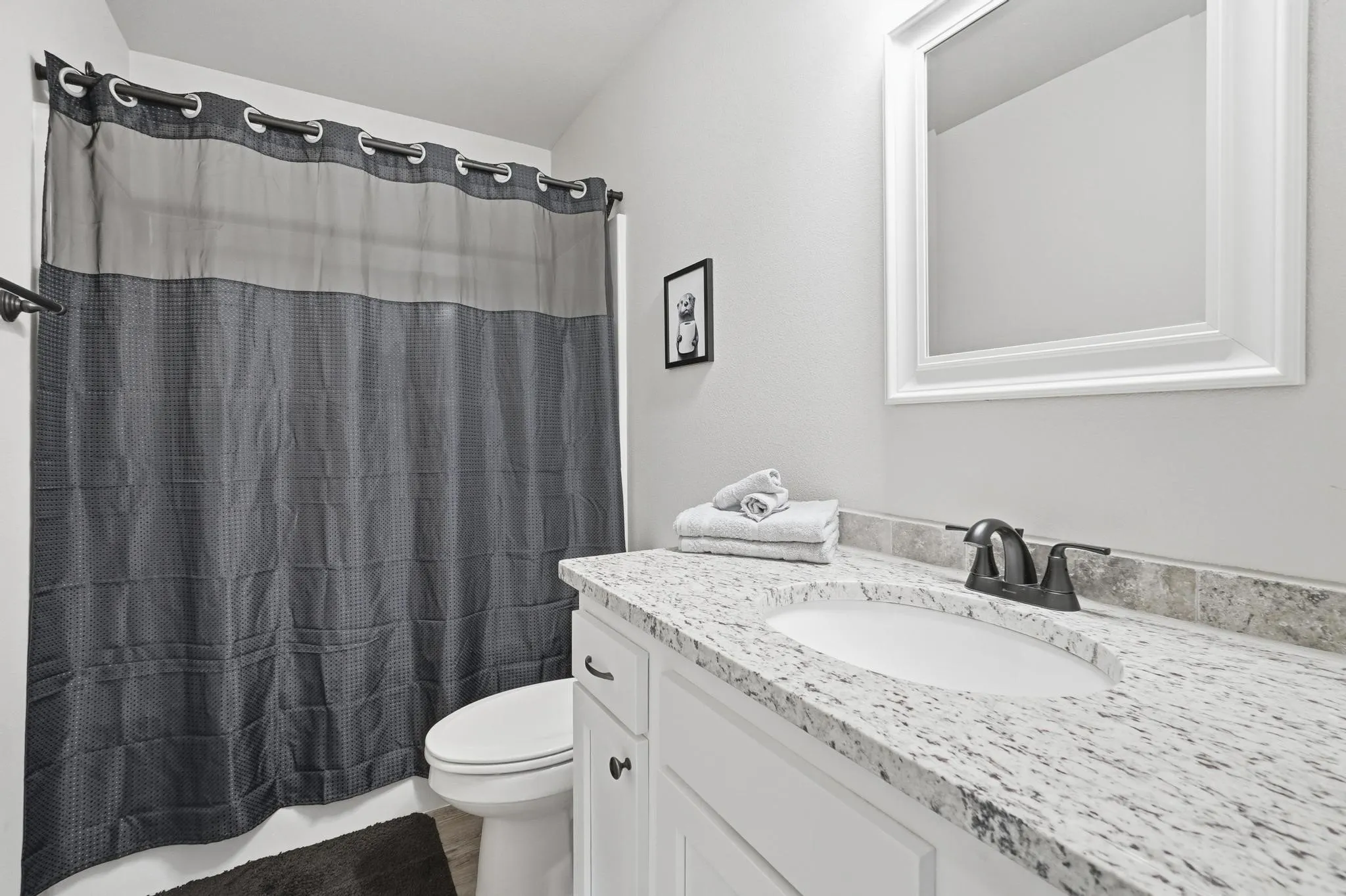 Per seller, these are pictures of an identical house but not the exact house.