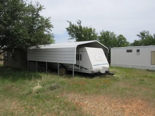 Mobile Home For Sale in Brown County , 3210 Captains Cove, May, Texas 76857, 3 Bedroom, 1 Bathroom, Garage spaces, 924 Sqft, built in 2009, Price $24,900, mls#21358900, Real Estate Agent in May, Homes For Sale in Brown county, Homes For Sale in May, Realtor in May Texas, Real Estate Brokerage Independent Realty Texas, Luminita Cordes Realtor