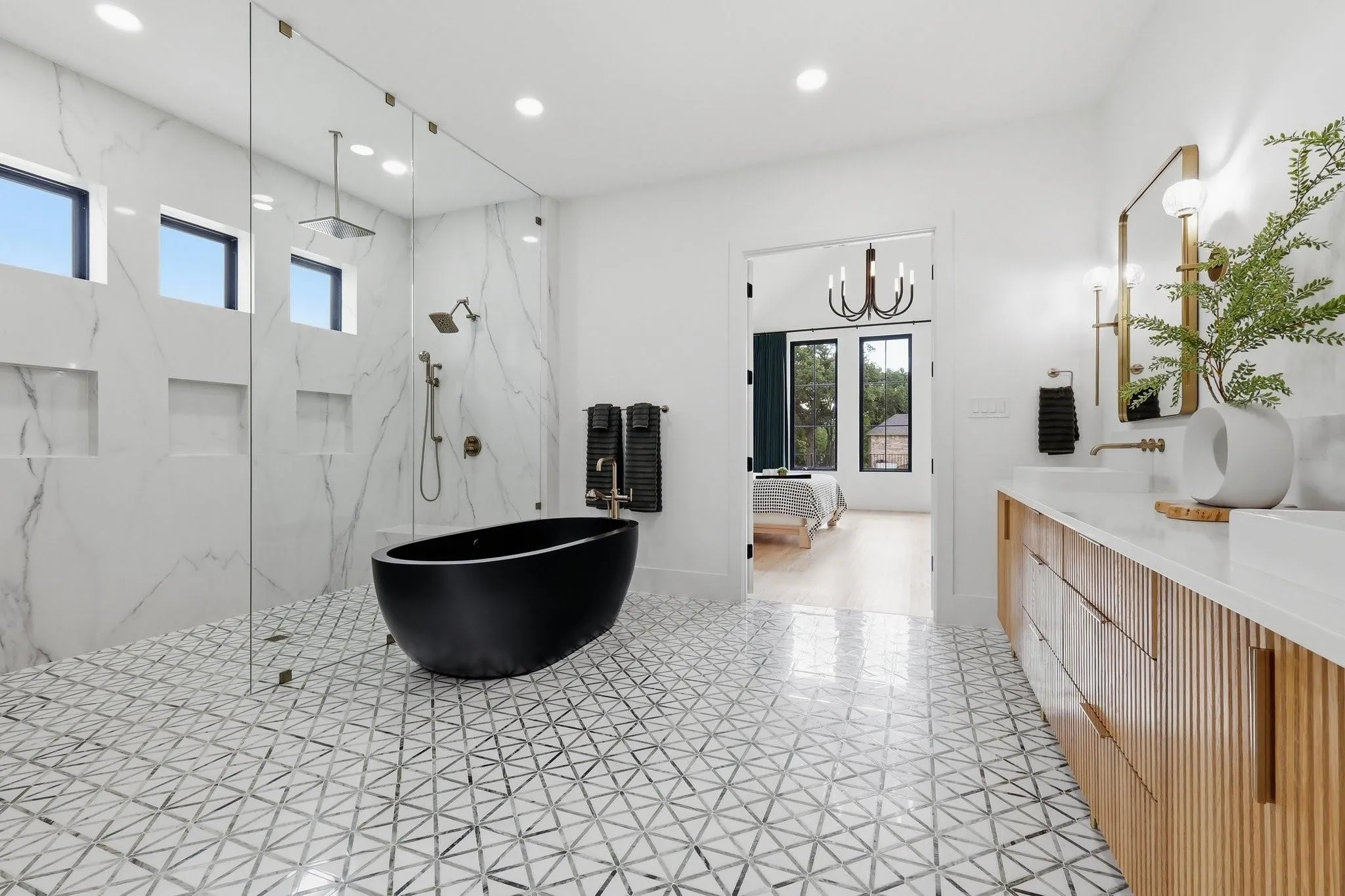 Not pictured is the boutique-style custom closet featuring floor-to-ceiling built-ins and ample drawer storage.

