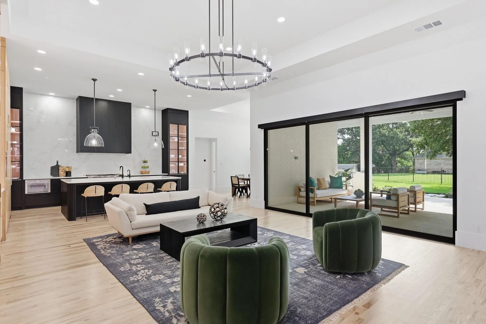 Approximately 80 new recessed can lights have been added throughout the home, along with curated designer lighting from Restoration Hardware.