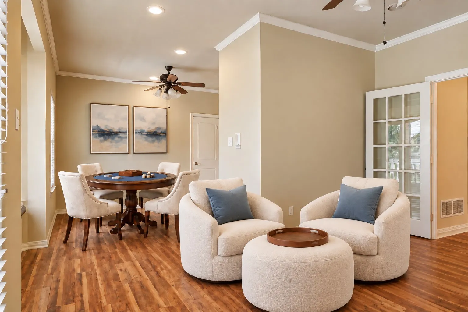 Hardwood-style flooring, crown molding, recessed lighting, and French doors