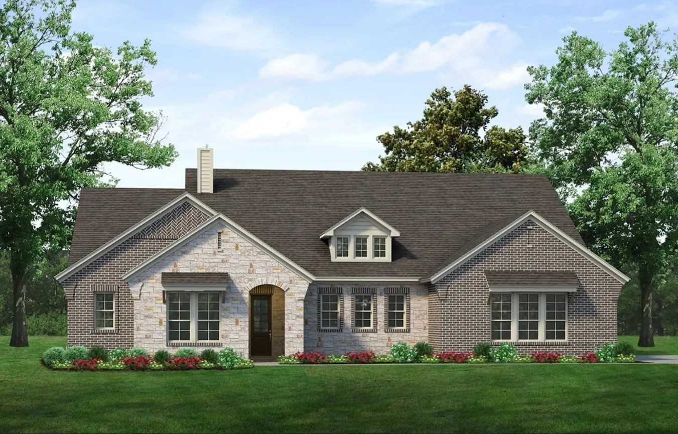 Exterior featuring a multi-gabled roofline, brick and stone facade, arched entryway, and dormer window