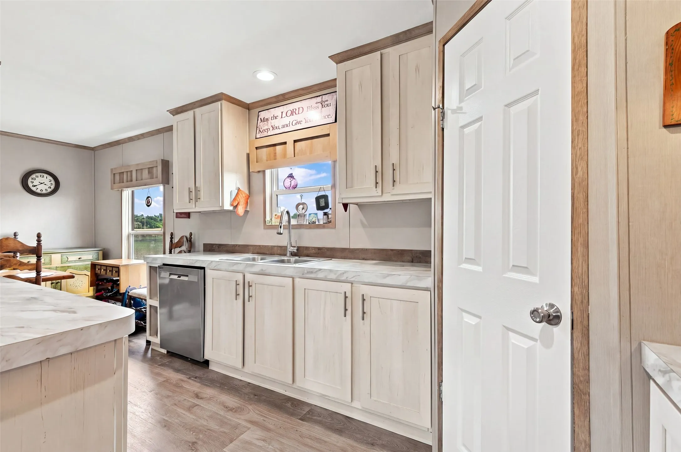Modern kitchen has walk-in pantry