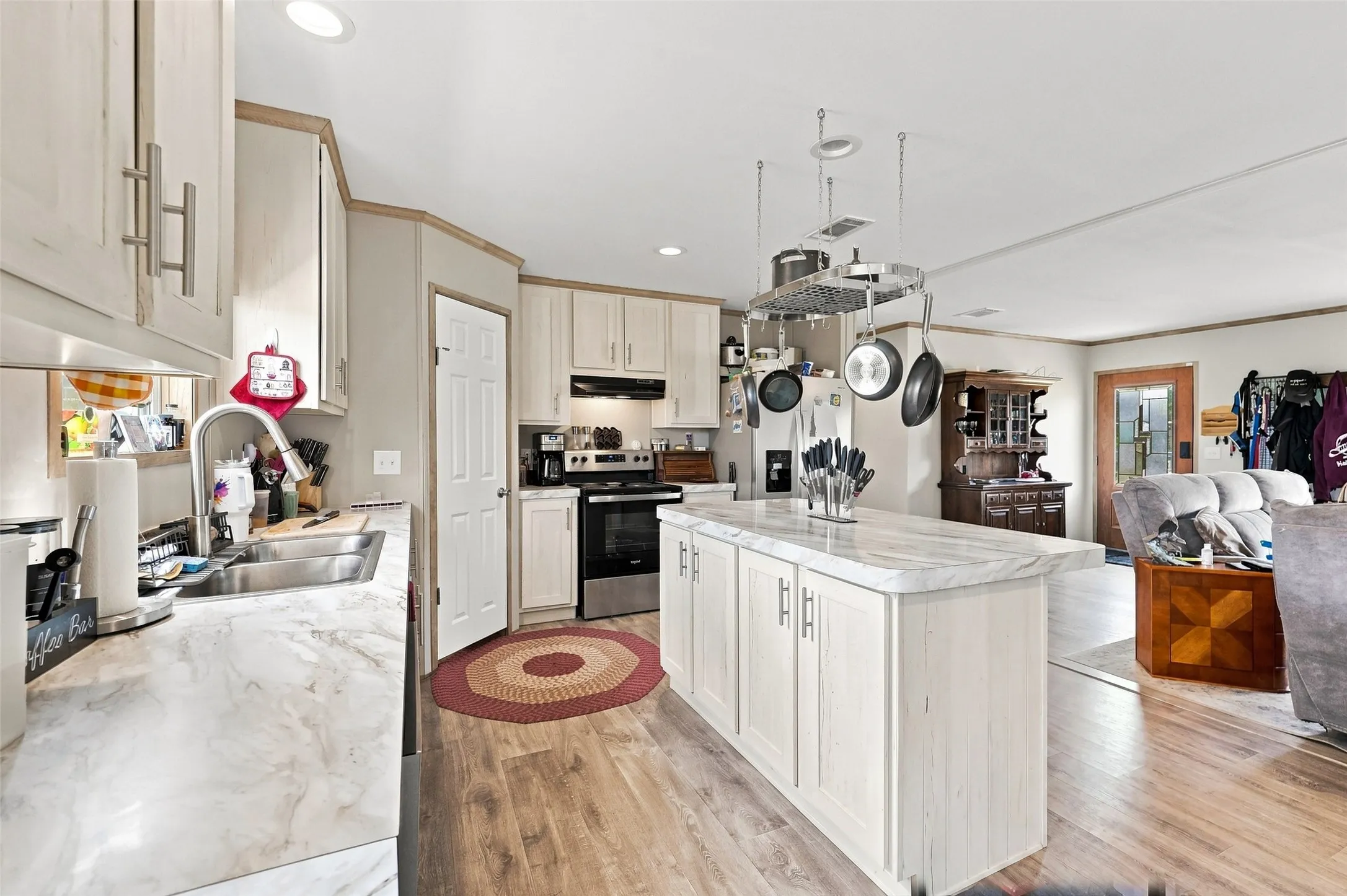 Modern kitchen has plenty of storage and prep space