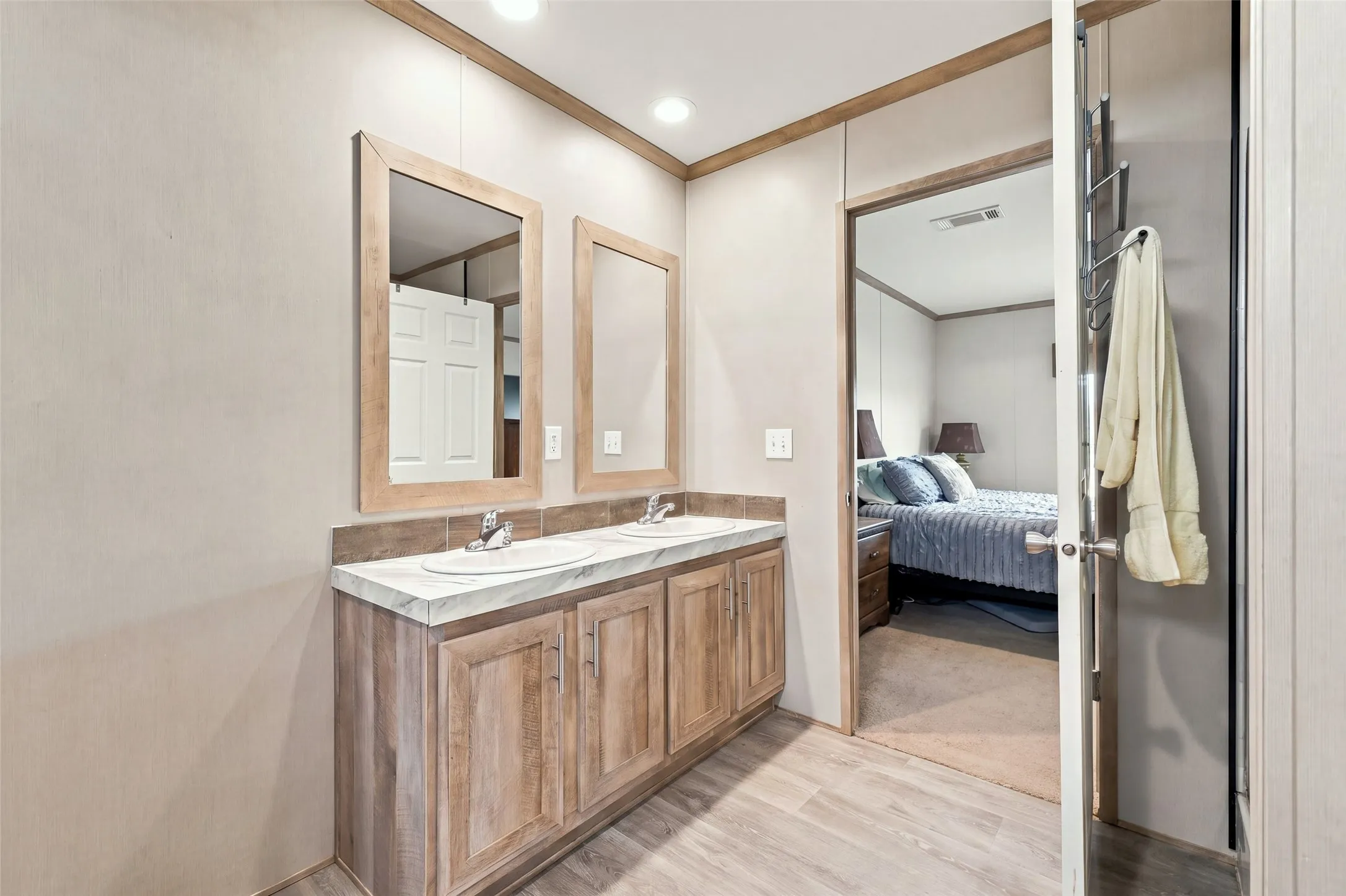 Ensuite primary bathroom has dual sinks