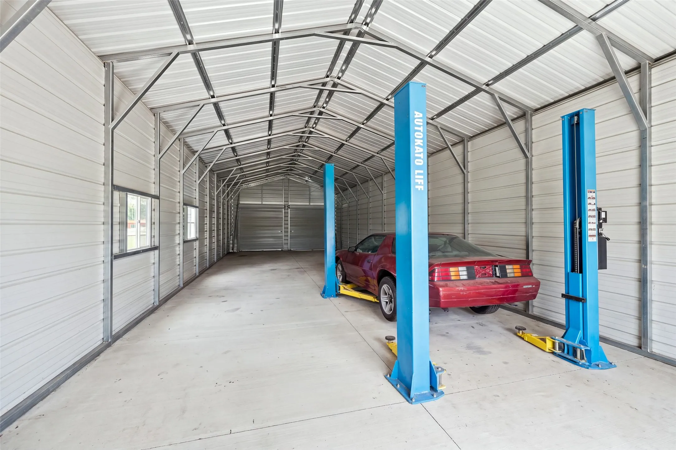 10,000 lb car lift in the enclosed 20x60 garage