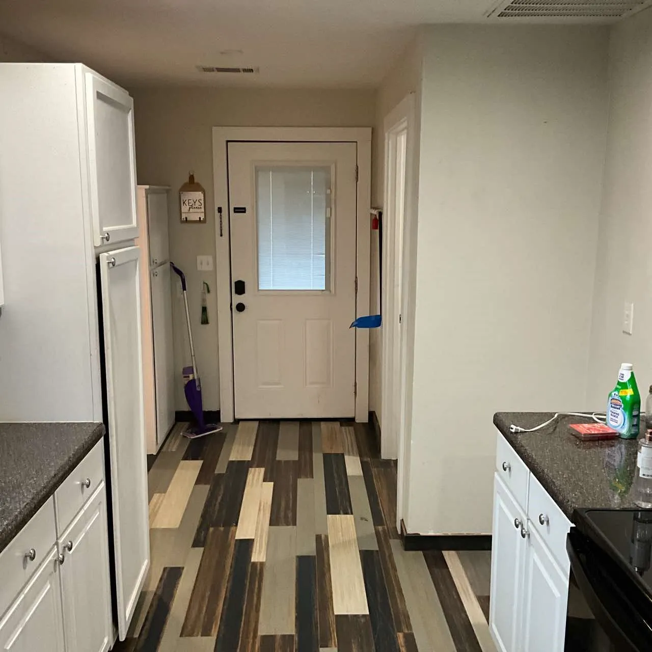 Kitchen leading to back yard
